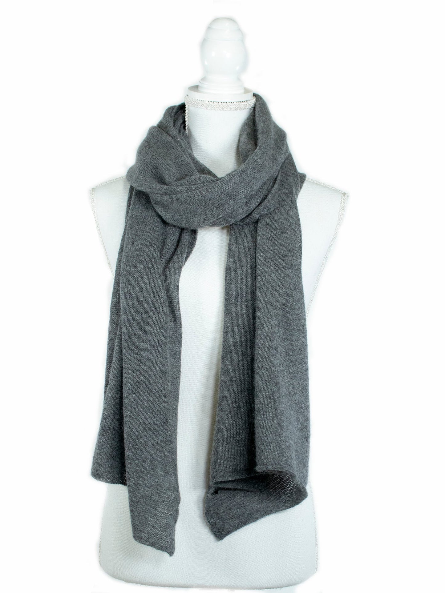 Lightweight cashmere wrap from Portolano in soft grey, ideal for elegant layering. 100% cashmere scarf in a timeless, breathable knit design.