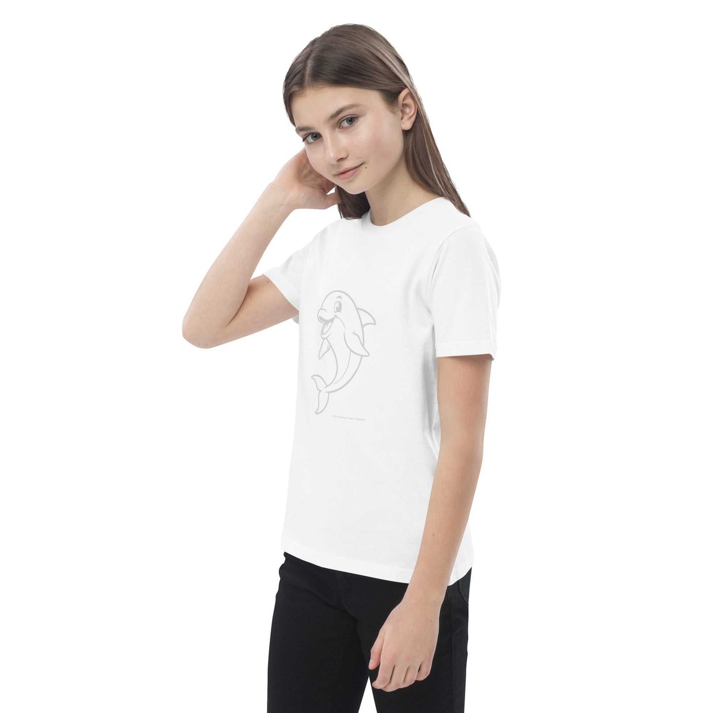 Child posing in white Kids Organic Cotton T-Shirt with Dolphin Design. GOTS certified and made with eco-conscious materials.