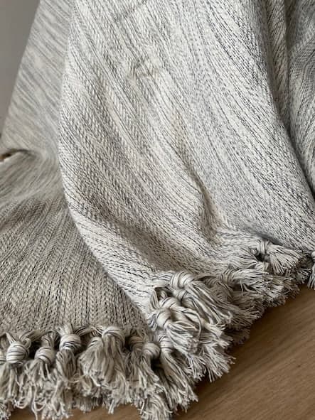 large cotton throw blanet in colour off white, soft grey and beige