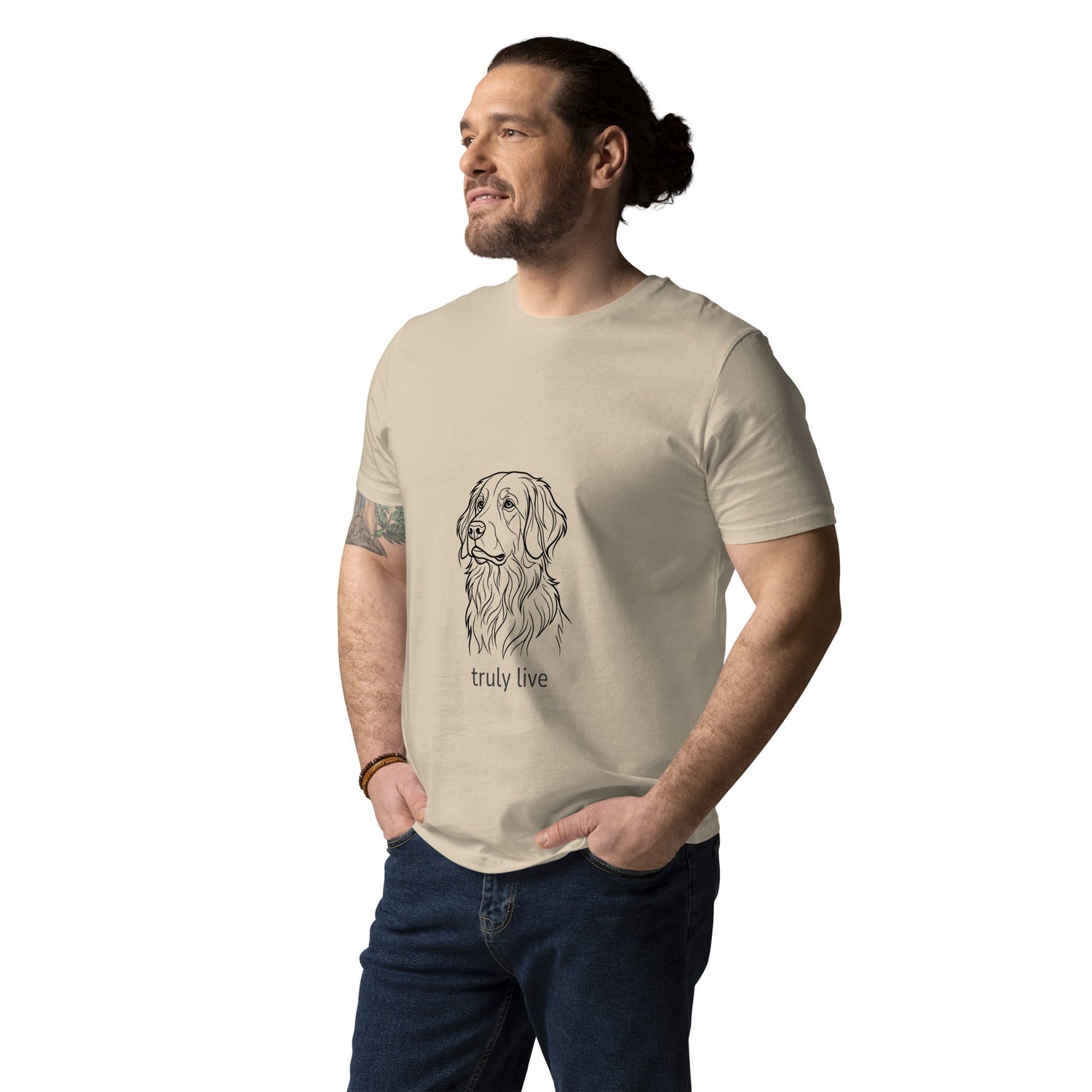 Man with a T-shirt depicting the head of a dog called Henry Stardust, with text ‘Truly live'
