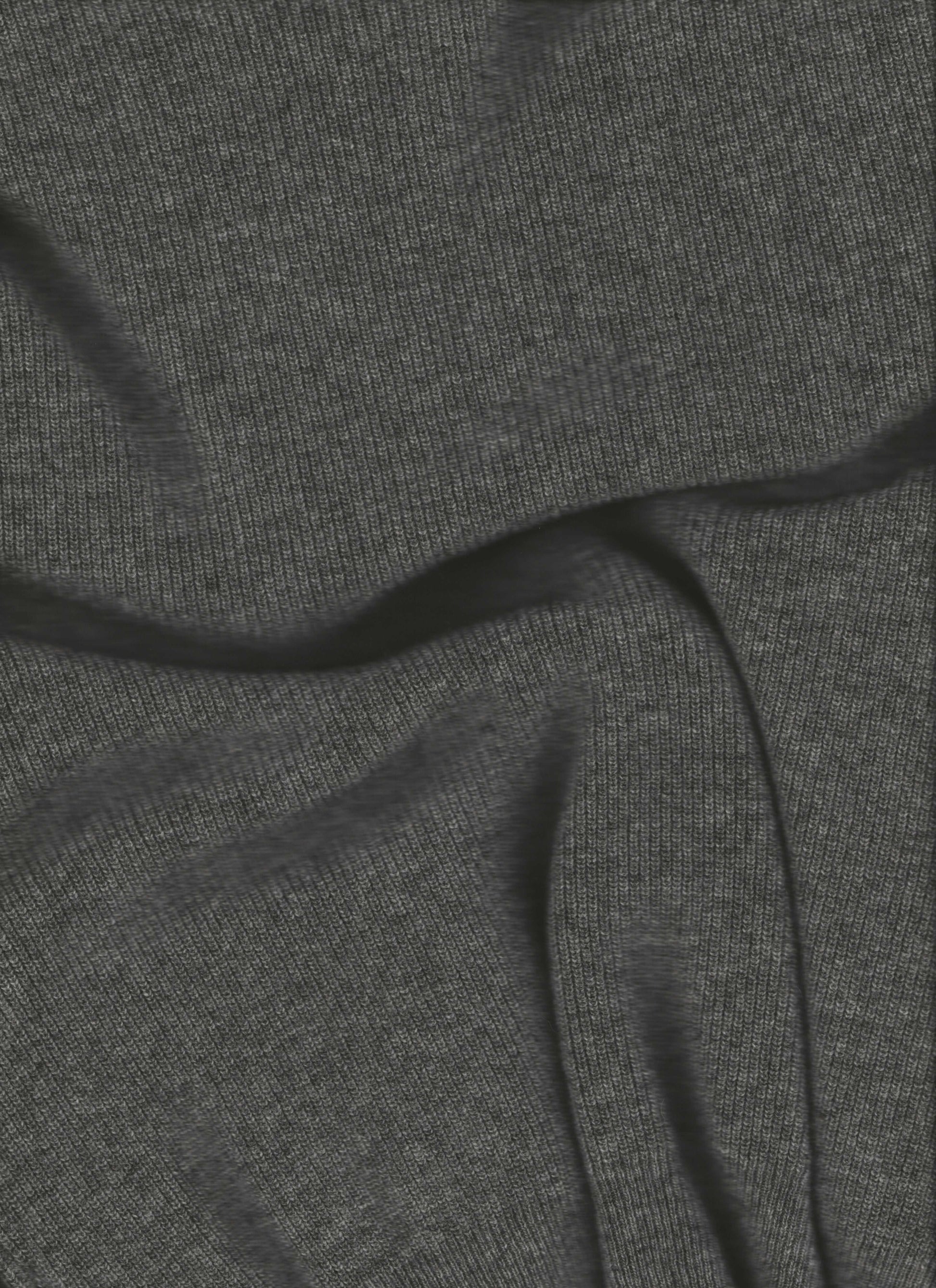 Dark grey Cashmere Mix Triangle Scarf fabric detail. Premium Italian knitwear with fine texture for versatile accessorizing.