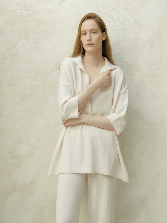 Sustainable Extra Fine Merino Wool Maxi Polo in ivory, featuring a soft drape and oversized silhouette for elegant everyday wear.