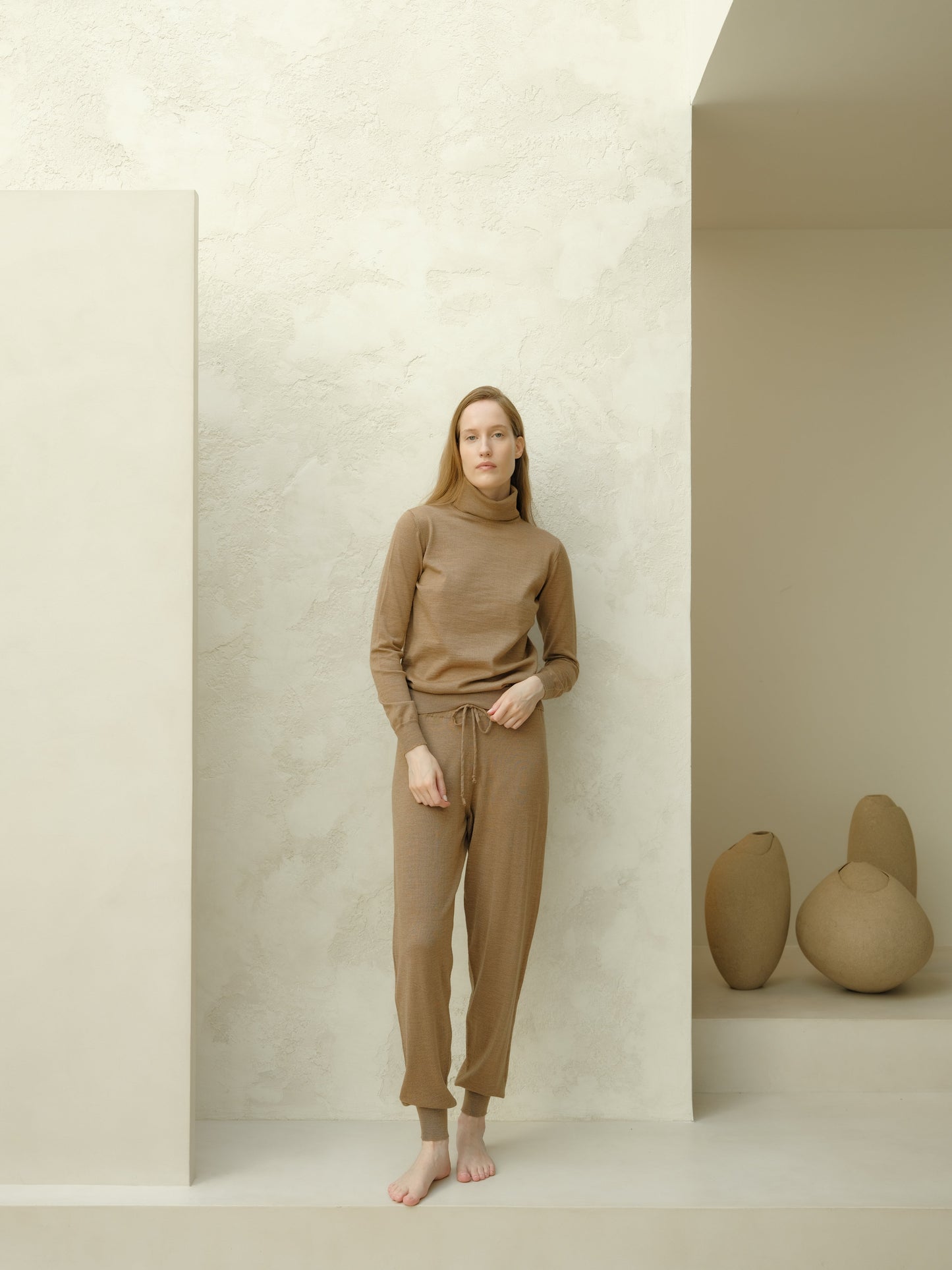 Extra Fine Merino Yoga Pants in camel brown by Lèmme. Lightweight Italian knitwear joggers for yoga and sustainable fashion.