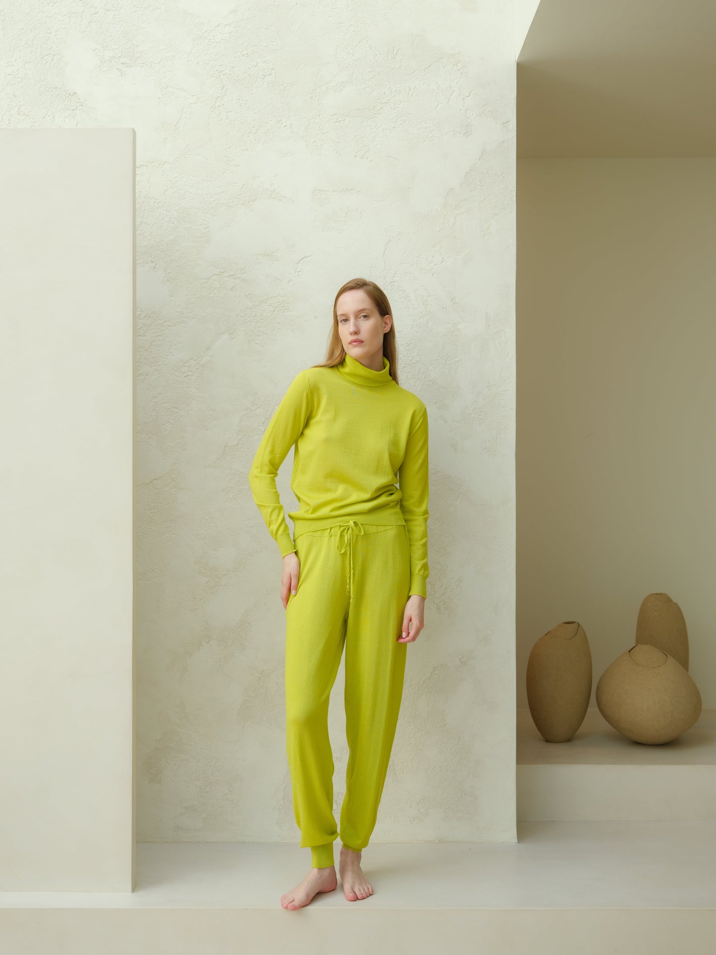 Extra Fine Merino Yoga Pants in lime green by Lèmme, Italian knitwear for women. Lightweight, breathable activewear joggers from HenryPawHaven.