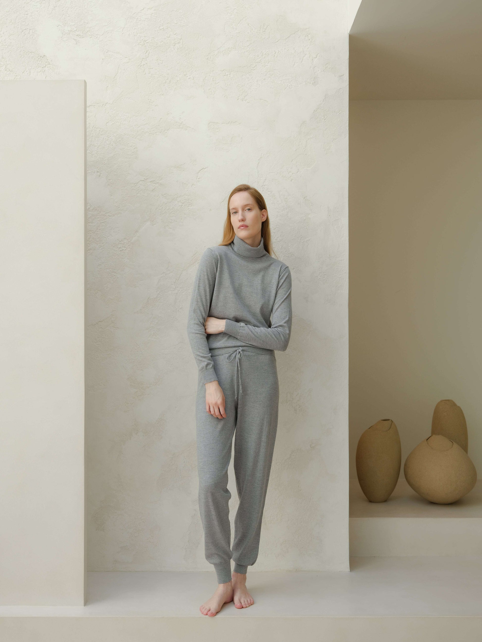 Extra Fine Merino Yoga Pants in heather grey by Lèmme. Breathable, eco-conscious Italian knit joggers for activewear.