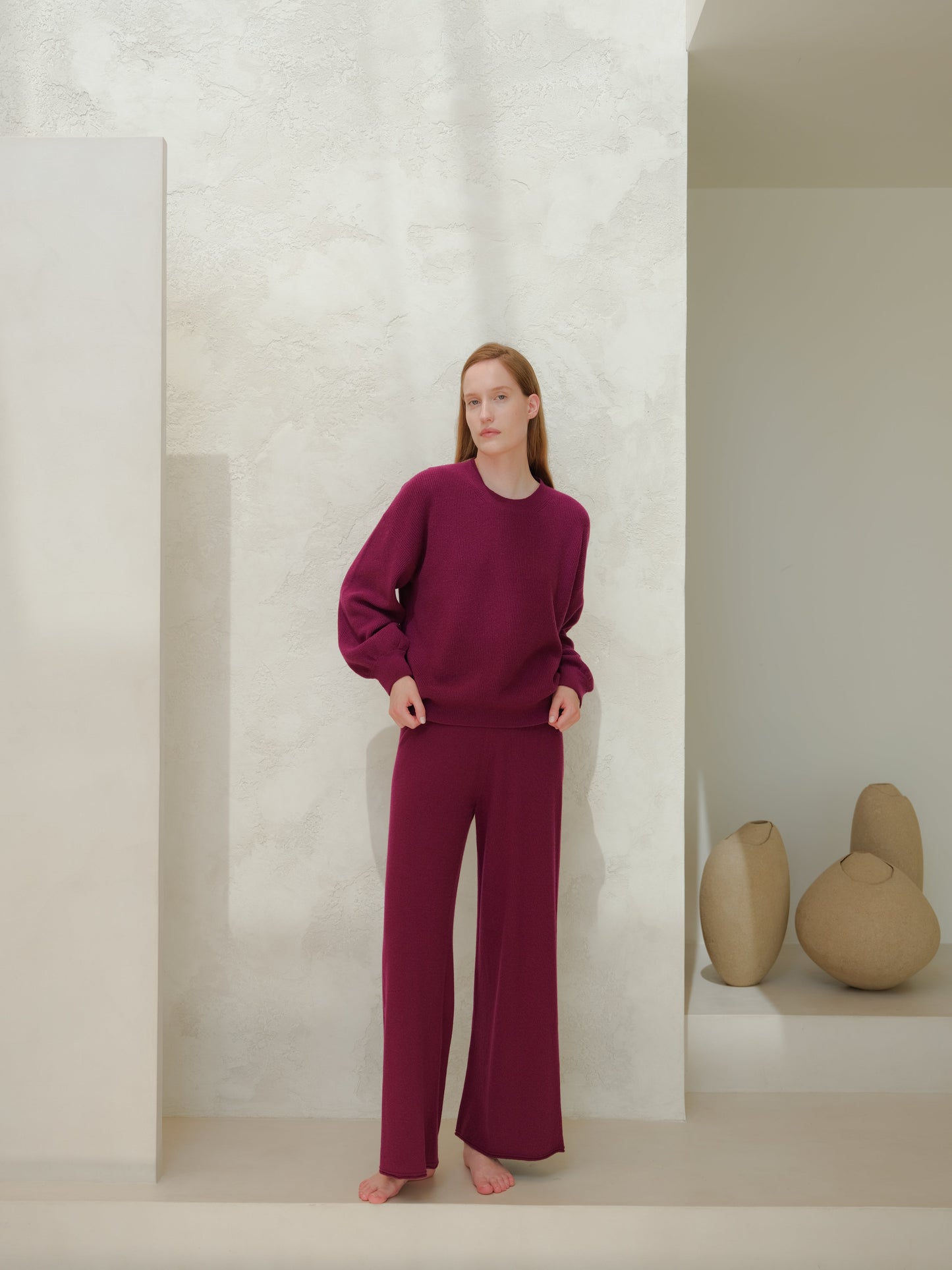Bakelite red 3D Cashmere Mix Wide Legged Light Pants by Lèmme, Italian knitwear with seamless construction for bold and luxurious style.