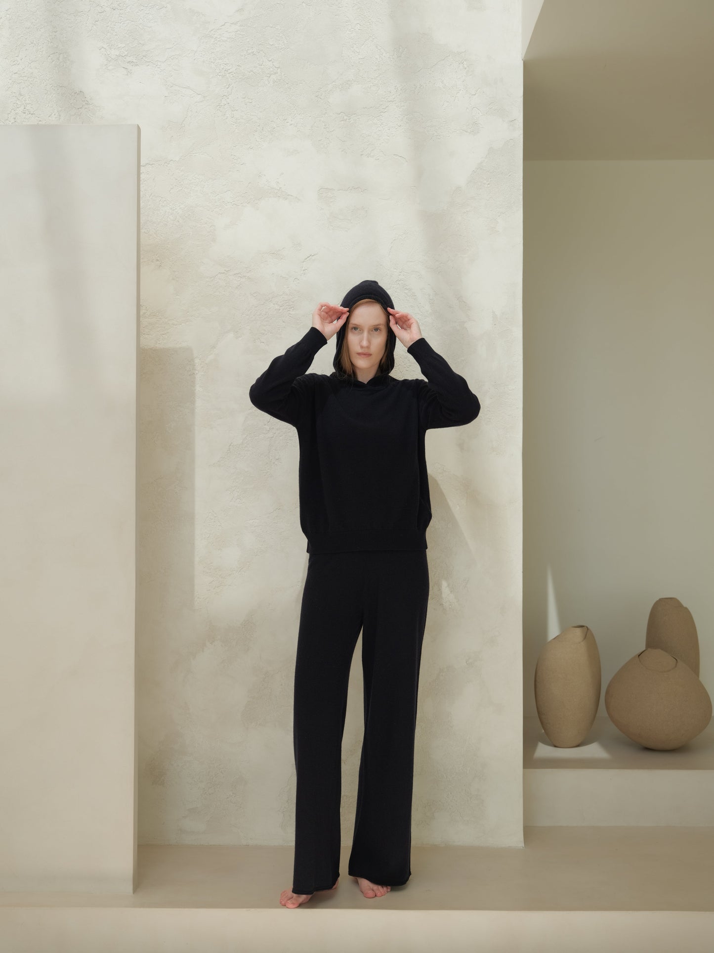Black 3D Cashmere Mix Wide Legged Light Pants by Lèmme with matching hoodie, Italian seamless knitwear for premium comfort and style.