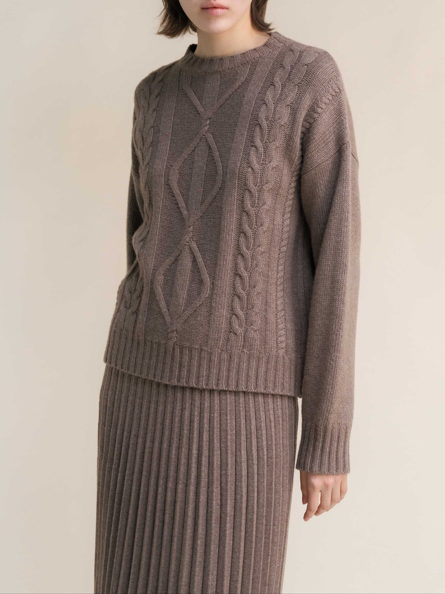 Taupe Cashmere Mix Cable Knit Sweater paired with matching ribbed skirt. Italian-crafted sustainable knitwear for refined comfort by HenryPawHaven.