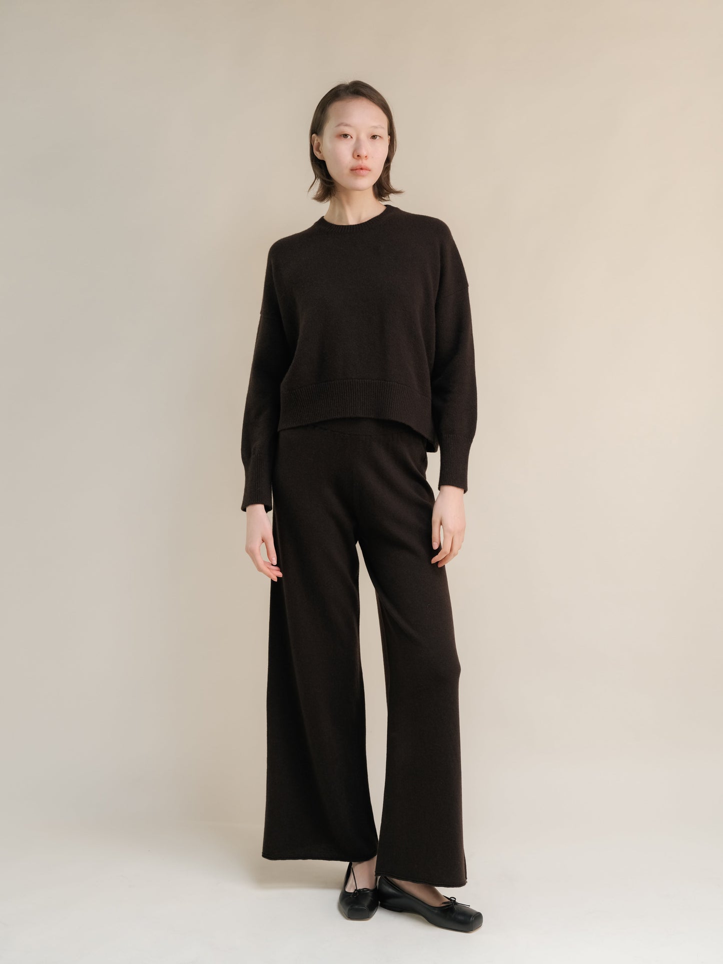 3D Cashmere Mix Wide Legged Light Pants in dark brown by Lèmme, Italian knitwear with a relaxed silhouette and premium wool-cashmere blend.