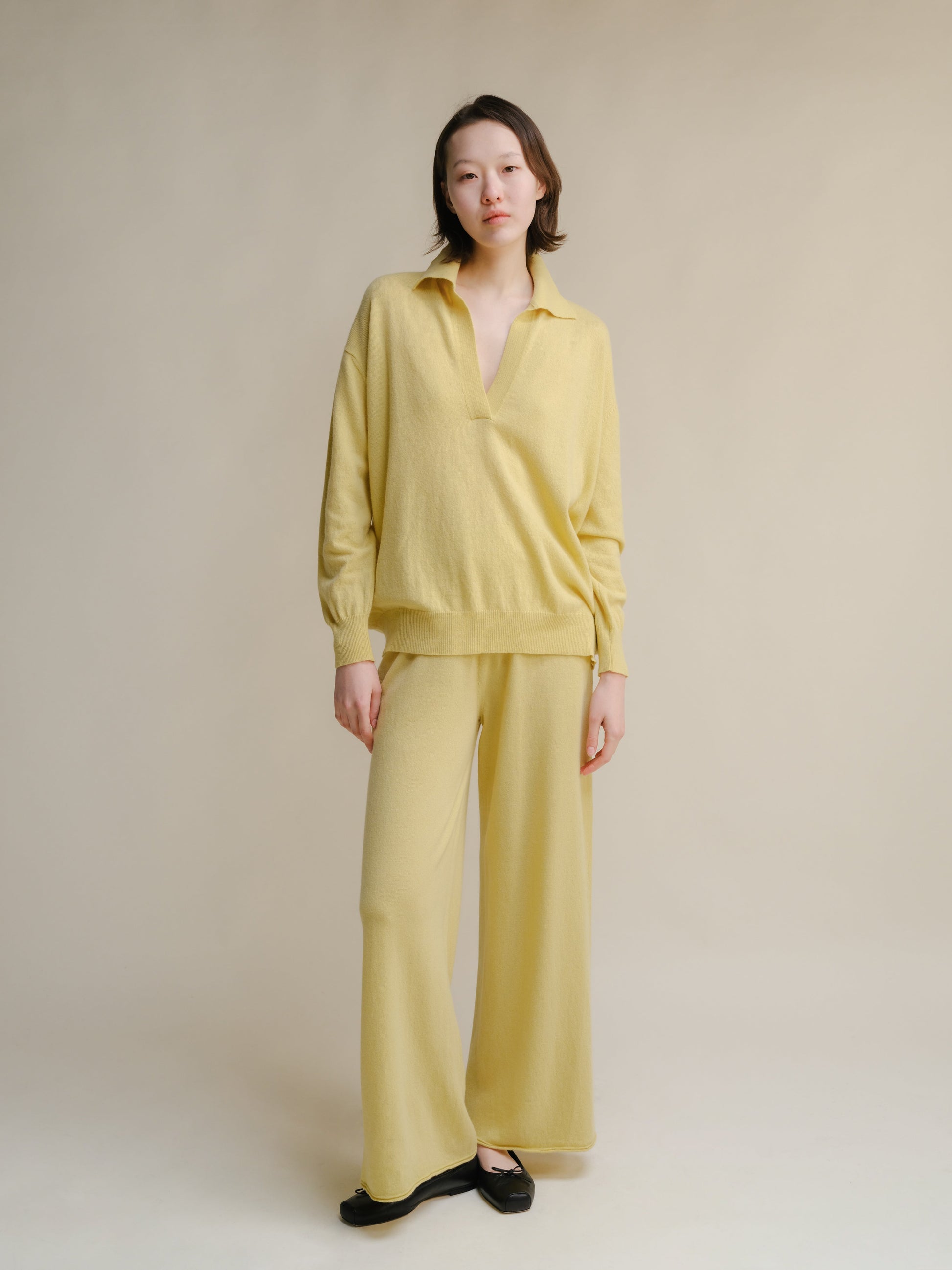 Yellow 3D Cashmere Mix Wide Legged Light Pants by Lèmme styled with matching top, Italian knitwear in premium cashmere blend for chic comfort.