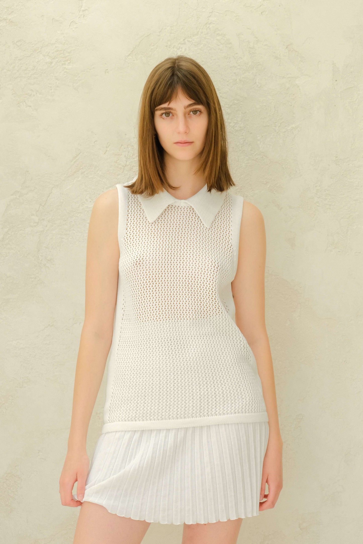 Fine Cotton Plissé Mini Skirt in white with sleeveless top