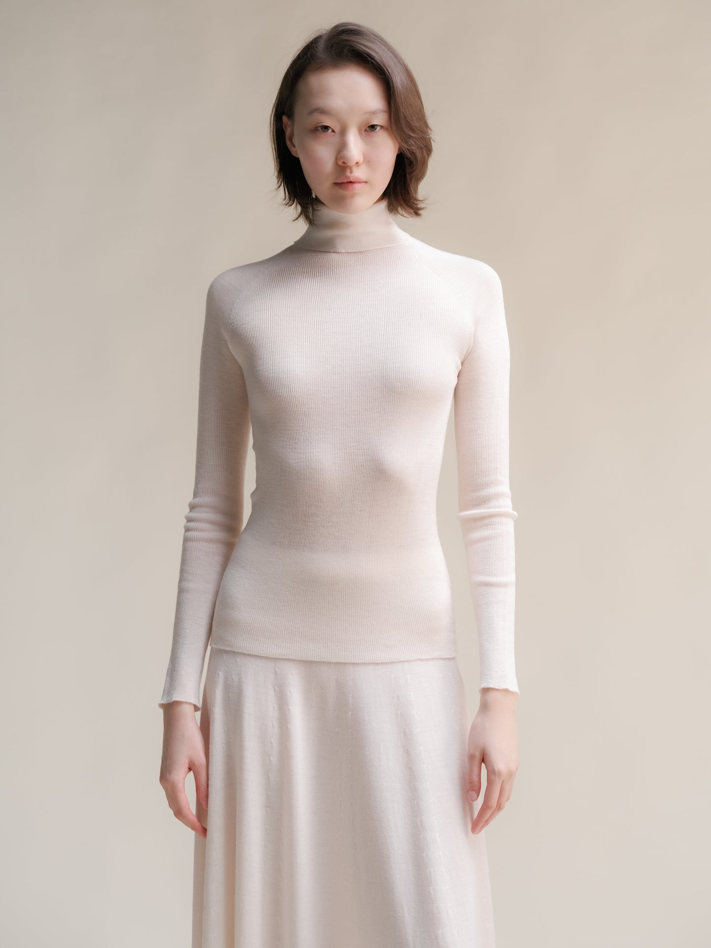Extrafeiner, gerippter Rollkragenpullover aus Merinowolle, 3D-Strick