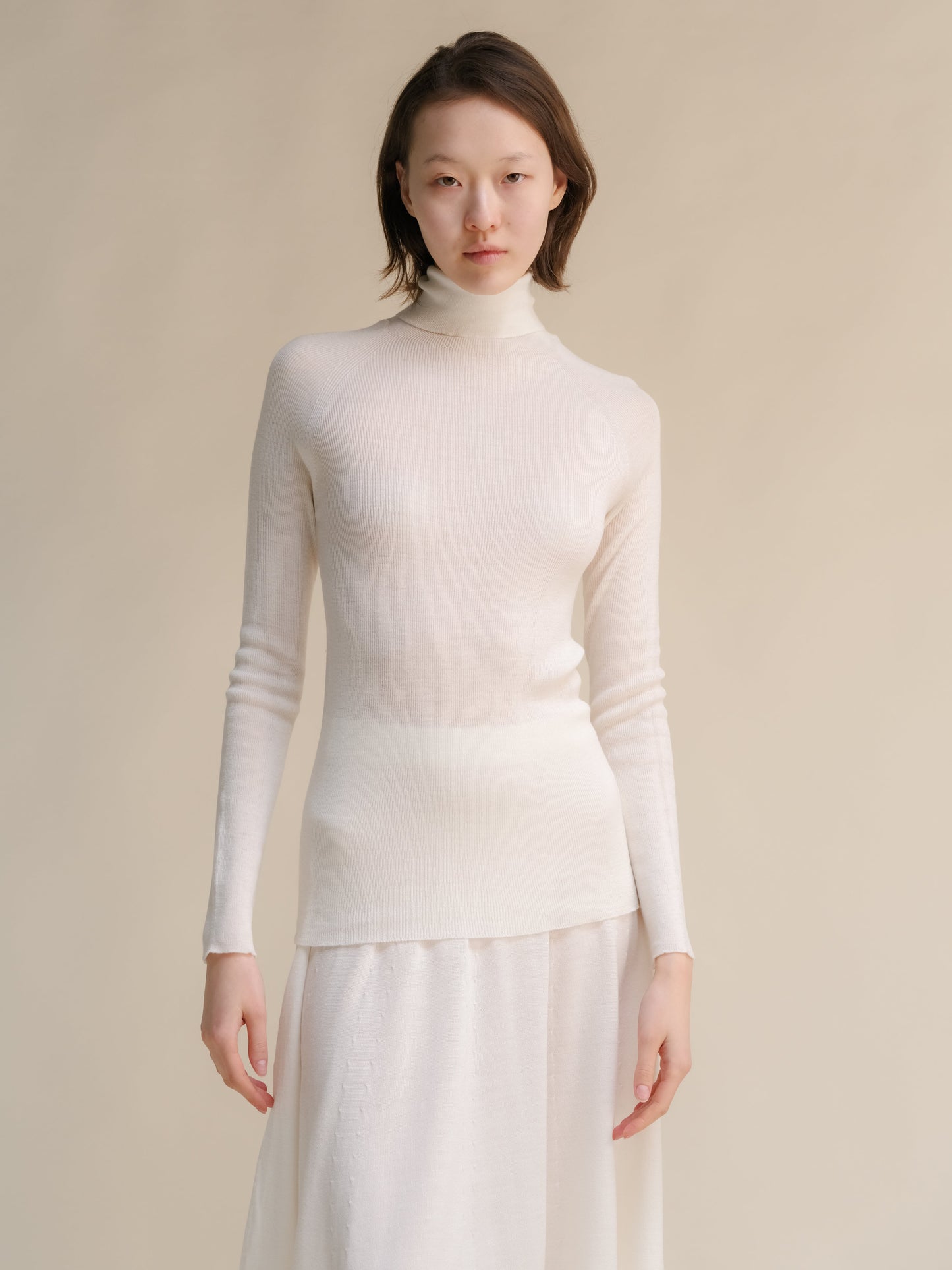 Extrafeiner, gerippter Rollkragenpullover aus Merinowolle, 3D-Strick