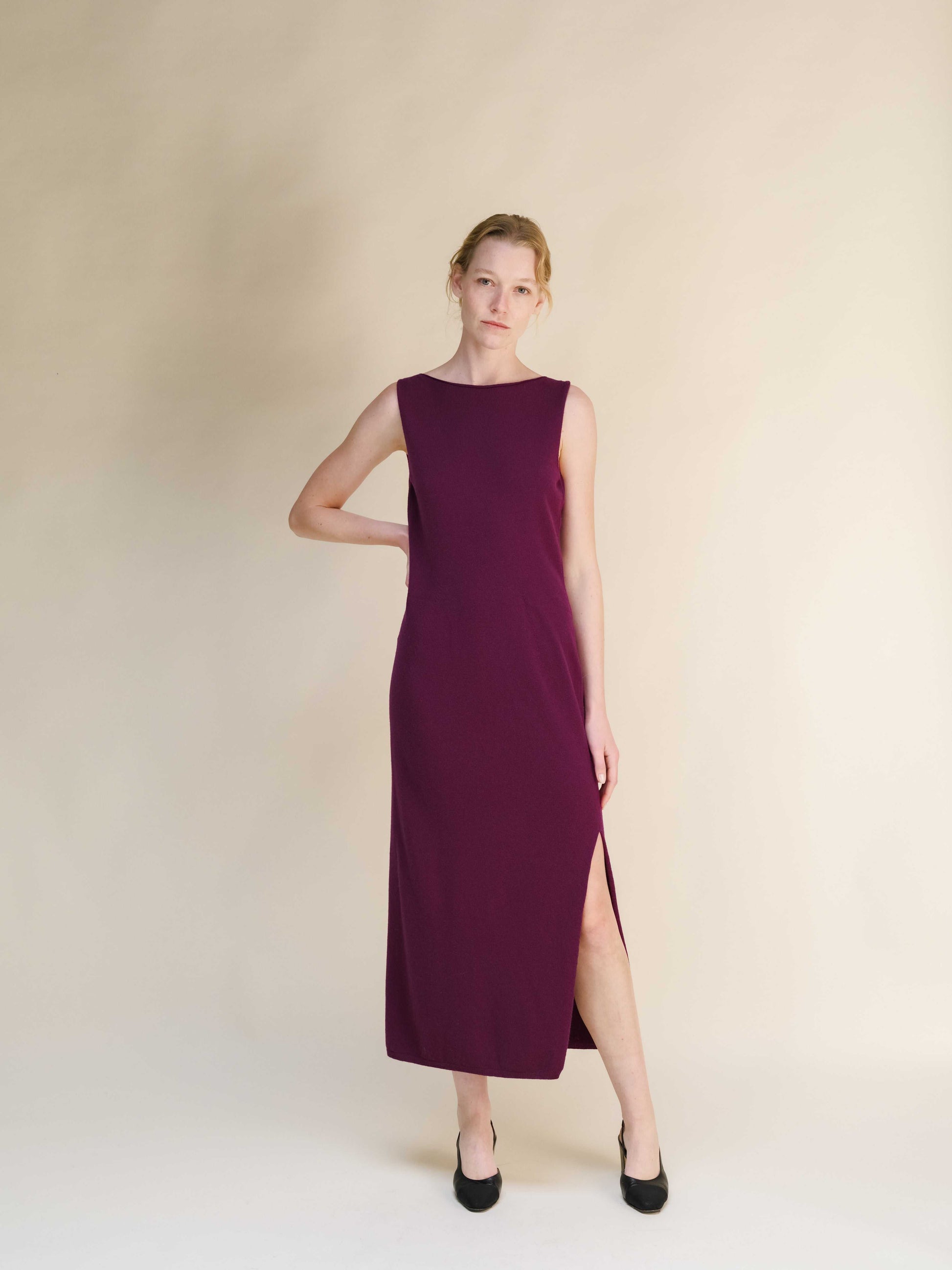 Plum Cashmere Boat Neck Sleeveless Dress in Italian knitwear, featuring a side slit and seamless 3D-knit construction.
