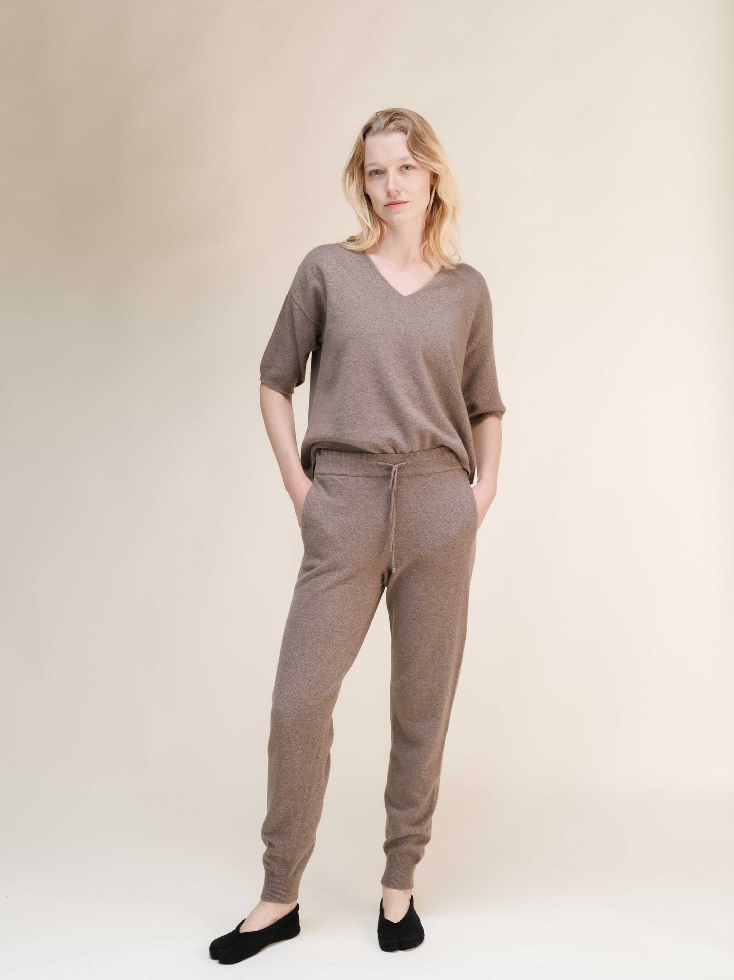 Taupe Cashmere Yoga Pants 3D-Knit with matching V-neck top, designed for premium comfort and sustainable fashion appeal.