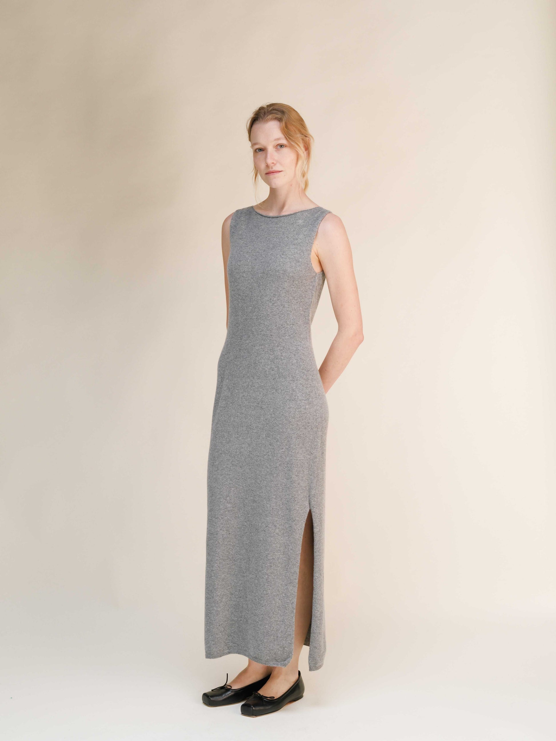 Heather grey Cashmere Boat Neck Sleeveless Dress in Italian 3D-knit cashmere, designed with a side slit for refined style.