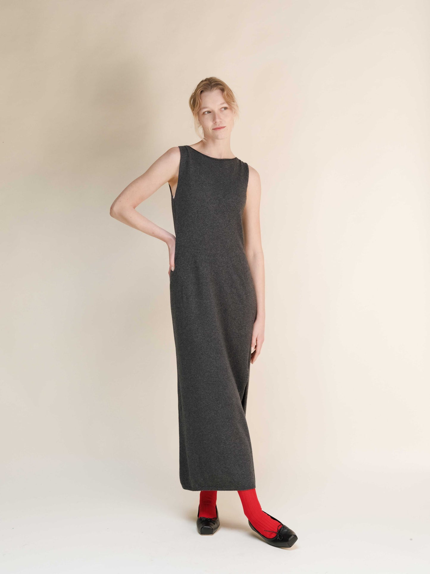 Charcoal grey Cashmere Boat Neck Sleeveless Dress in Italian knitwear with side slit, seamless 3D-knit design, premium fabric.