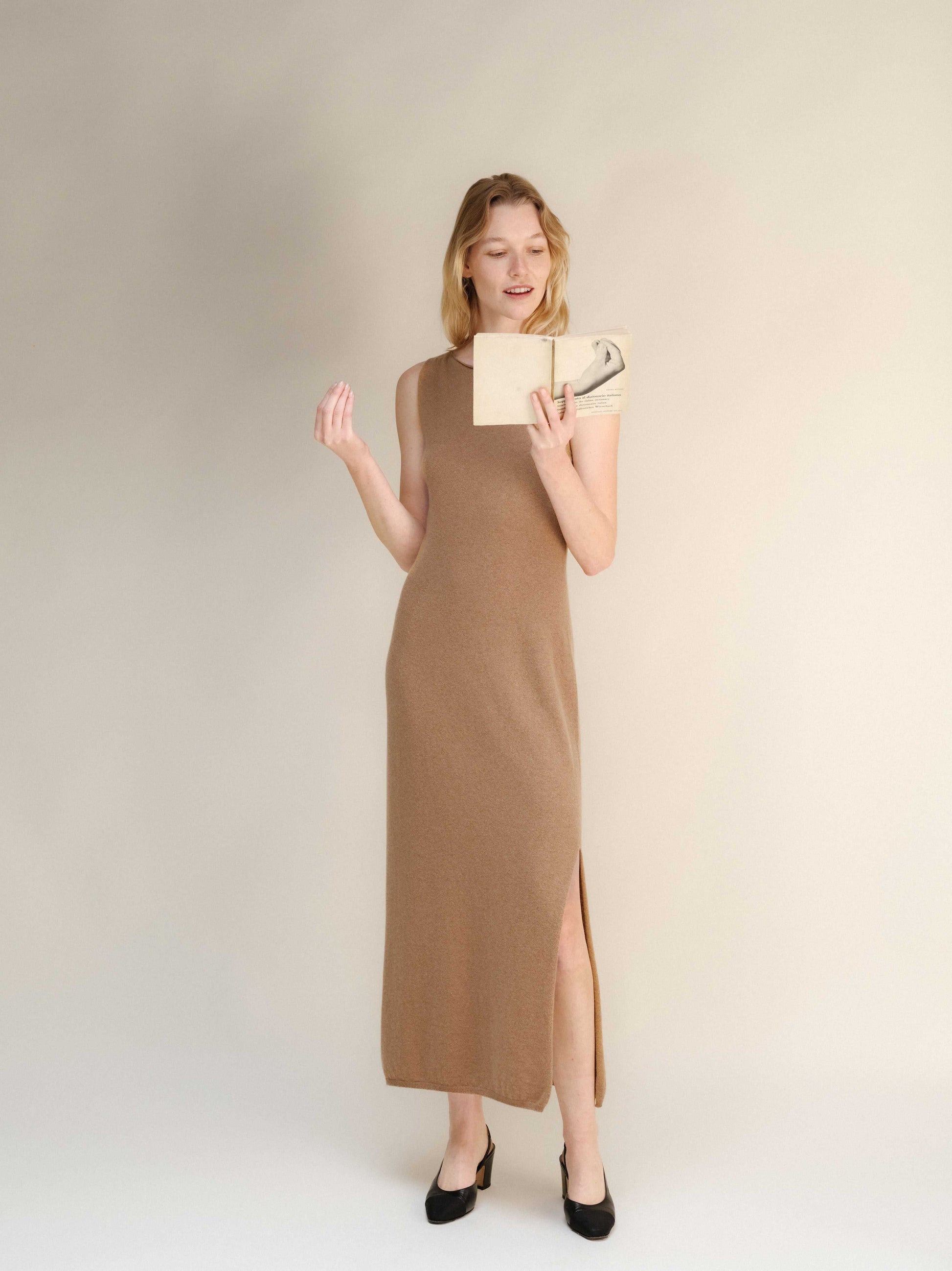 Camel-toned Cashmere Boat Neck Sleeveless Dress in Italian knitwear, showcasing a side slit and soft 3D-knit texture.