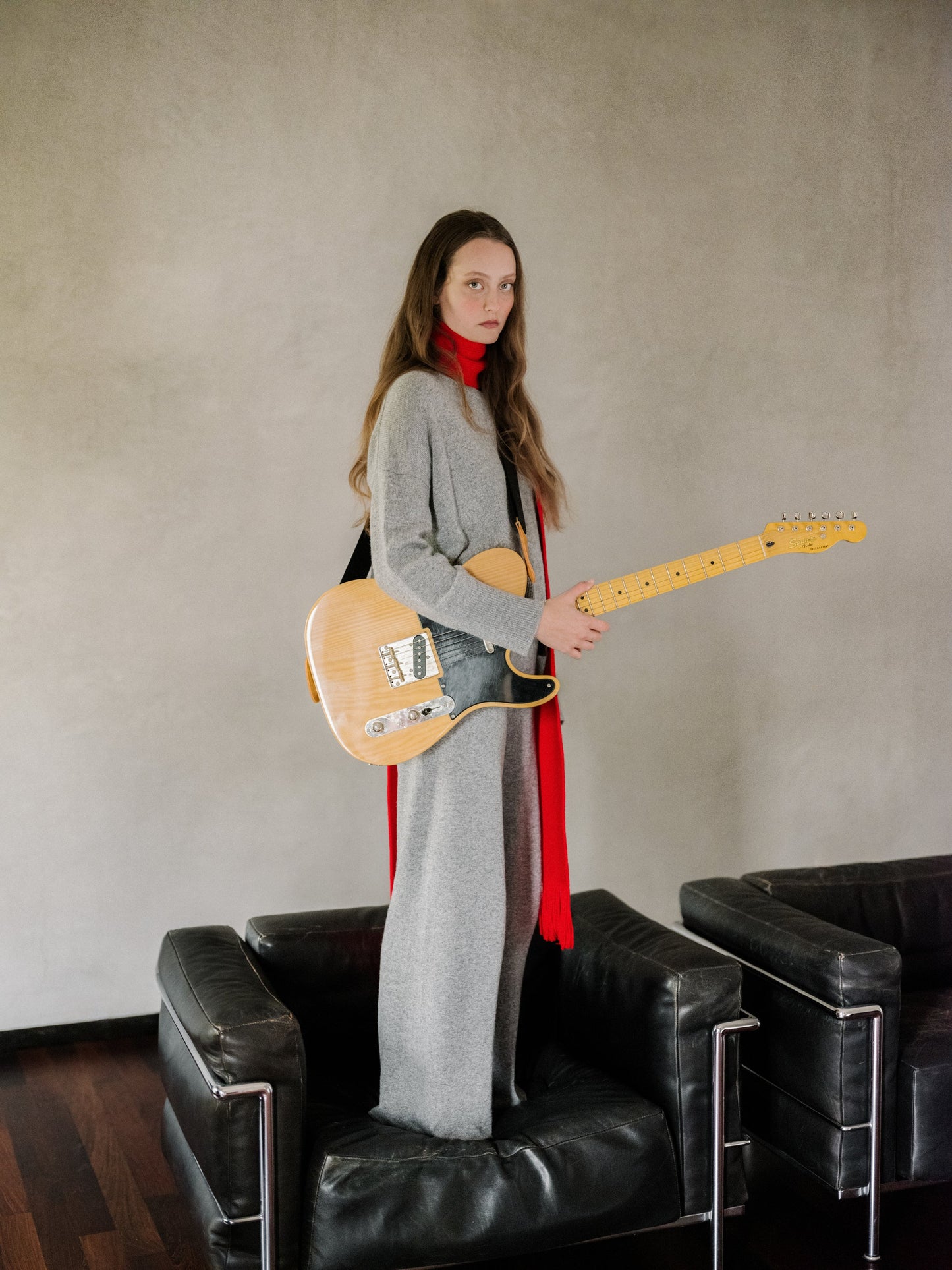 Gray 3D Cashmere Mix Wide Legged Light Pants by Lèmme styled with red scarf, Italian knitwear in premium cashmere blend for modern fashion.