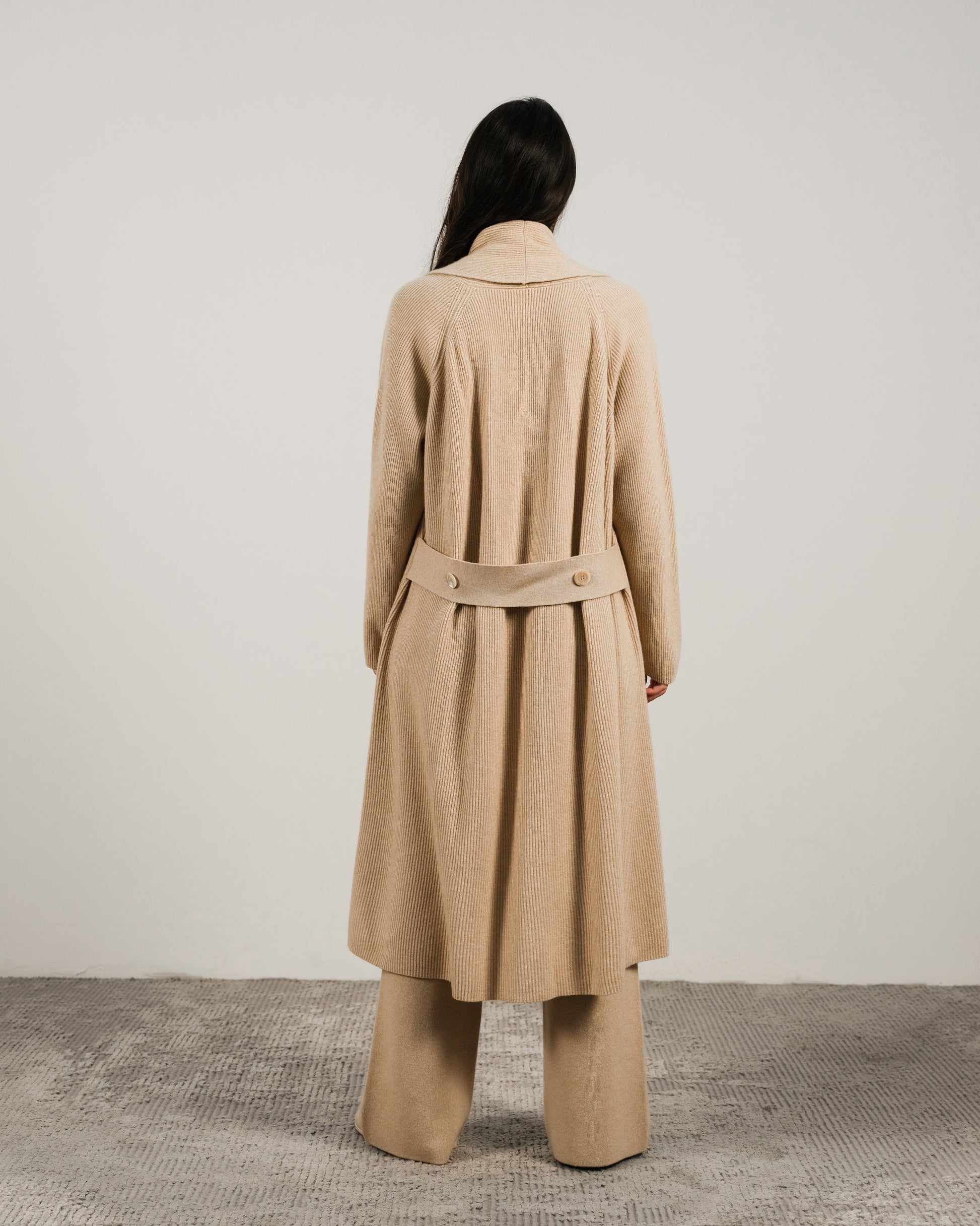 Rear view of camel Cashmere Mix Shawl-Collar Maxi Ribbed Cardigan paired with wide-leg pants, showcasing Italian knitwear tailoring.