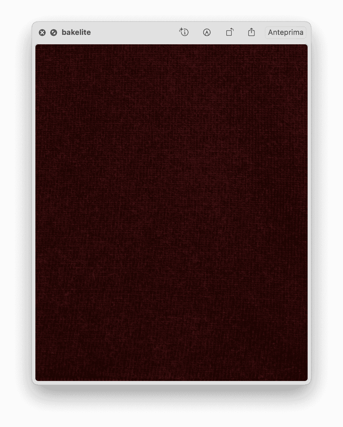 Cashmere Mix Triangle Scarf in bakelite burgundy, crafted from soft Italian knitwear for timeless and versatile fashion.