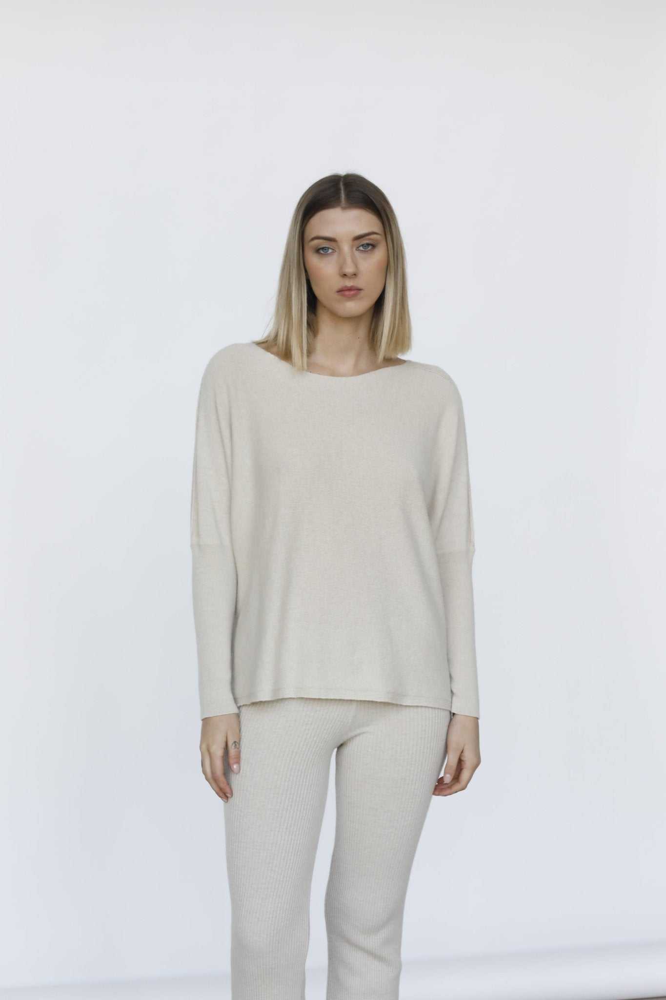 Front-facing look at Margot Box-Fit Wool Sweater by Tenné, highlighting its minimalist design and cozy 100% wool texture.