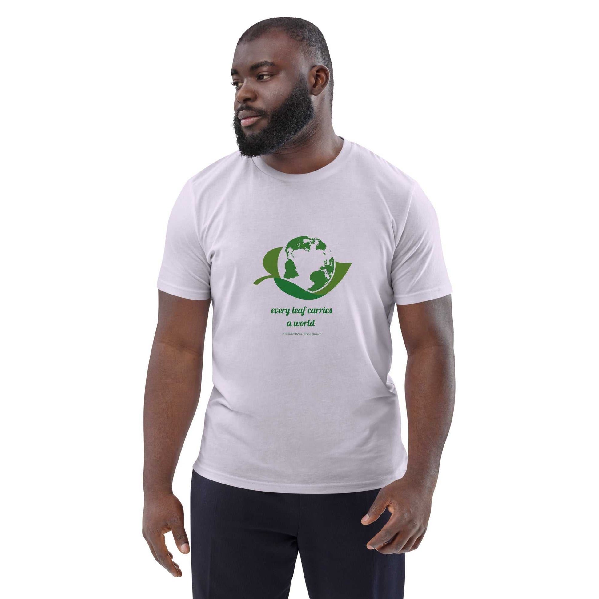 White Organic Cotton Nature T-Shirt with green Earth and leaf design and 'Every Leaf Carries a World' slogan, unisex and eco-friendly.