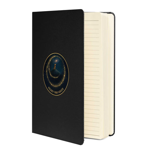 Black Hardcover Bound Notebook 5.5" × 8.5" with cream lined pages and HenryPawHaven logo, ideal for journaling or note-taking.