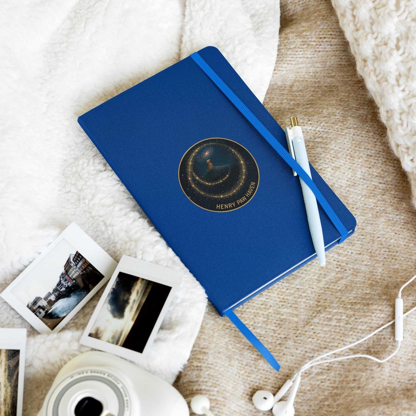 Blue Hardcover Bound Notebook 5.5" × 8.5" with 80 lined pages and HenryPawHaven logo, shown with pen and cozy accessories.
