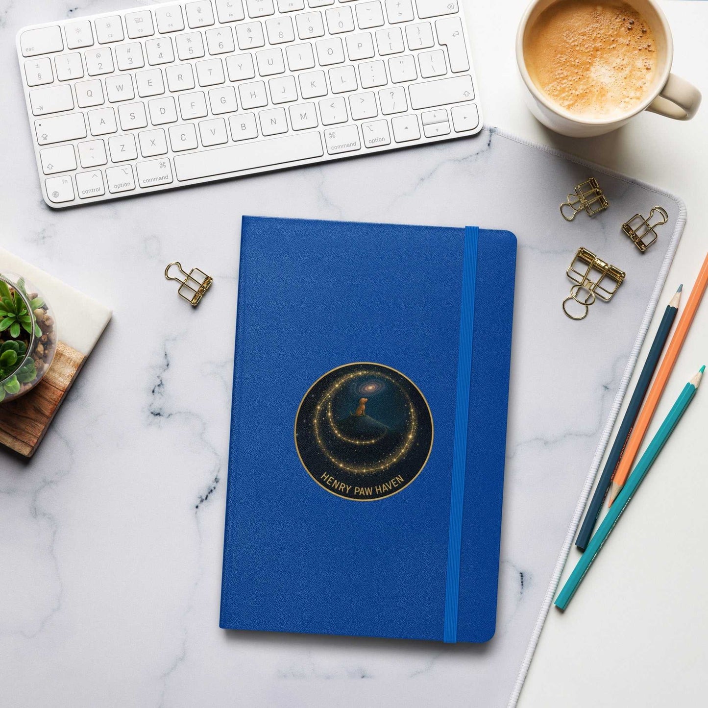 Royal blue Hardcover Bound Notebook 5.5" × 8.5" with elastic closure and HenryPawHaven logo, ideal for journaling or brainstorming sessions.