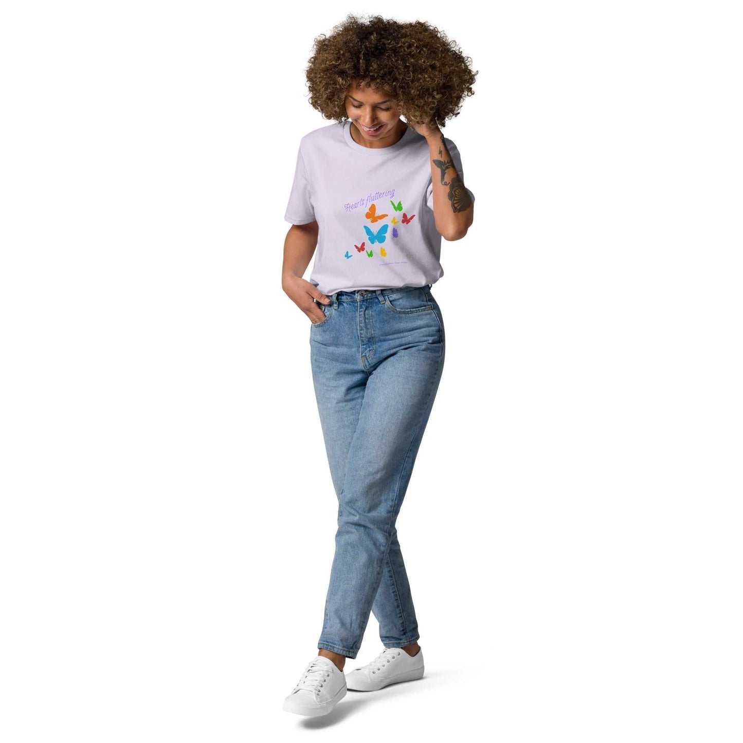 Hearts Fluttering T-Shirt in white with colorful butterfly design, unisex organic cotton for sustainable spring fashion.