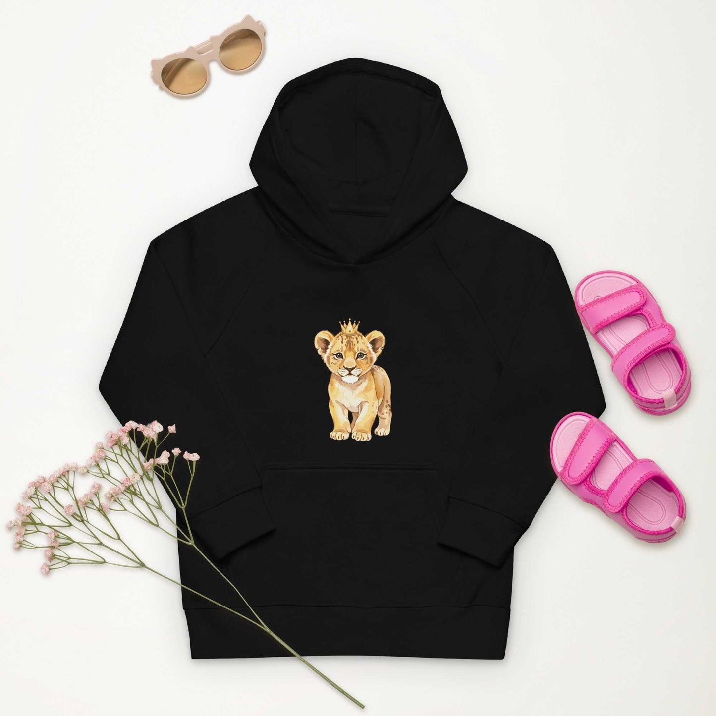 Black Kids Eco Hoodie with baby lion design, styled with pink sandals and sunglasses, perfect for playful and cozy outfits.
