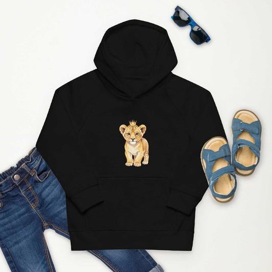 Kids eco hoodie with baby lion design in black, styled with jeans, sandals, and sunglasses. Made from organic cotton for natural comfort.