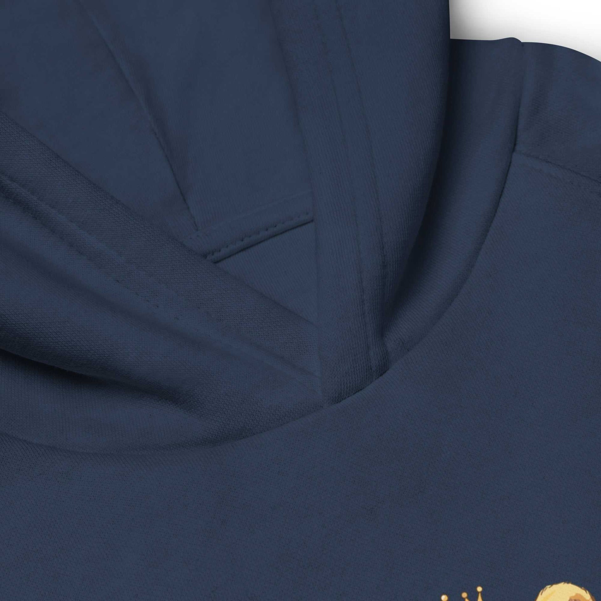 Close-up of navy blue kids eco hoodie neckline with baby lion design. Cozy organic cotton fabric with reinforced stitching.
