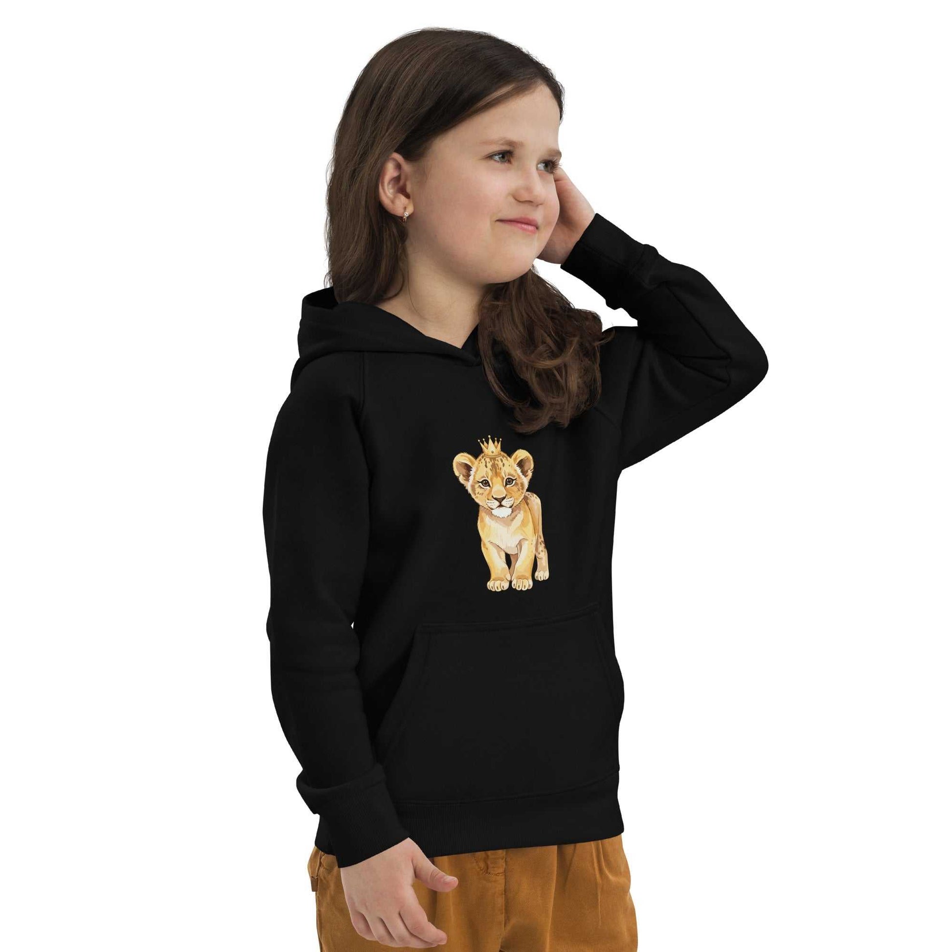 Side view of child in black Kids Eco Hoodie with baby lion graphic, highlighting soft fabric and playful eco-friendly style.