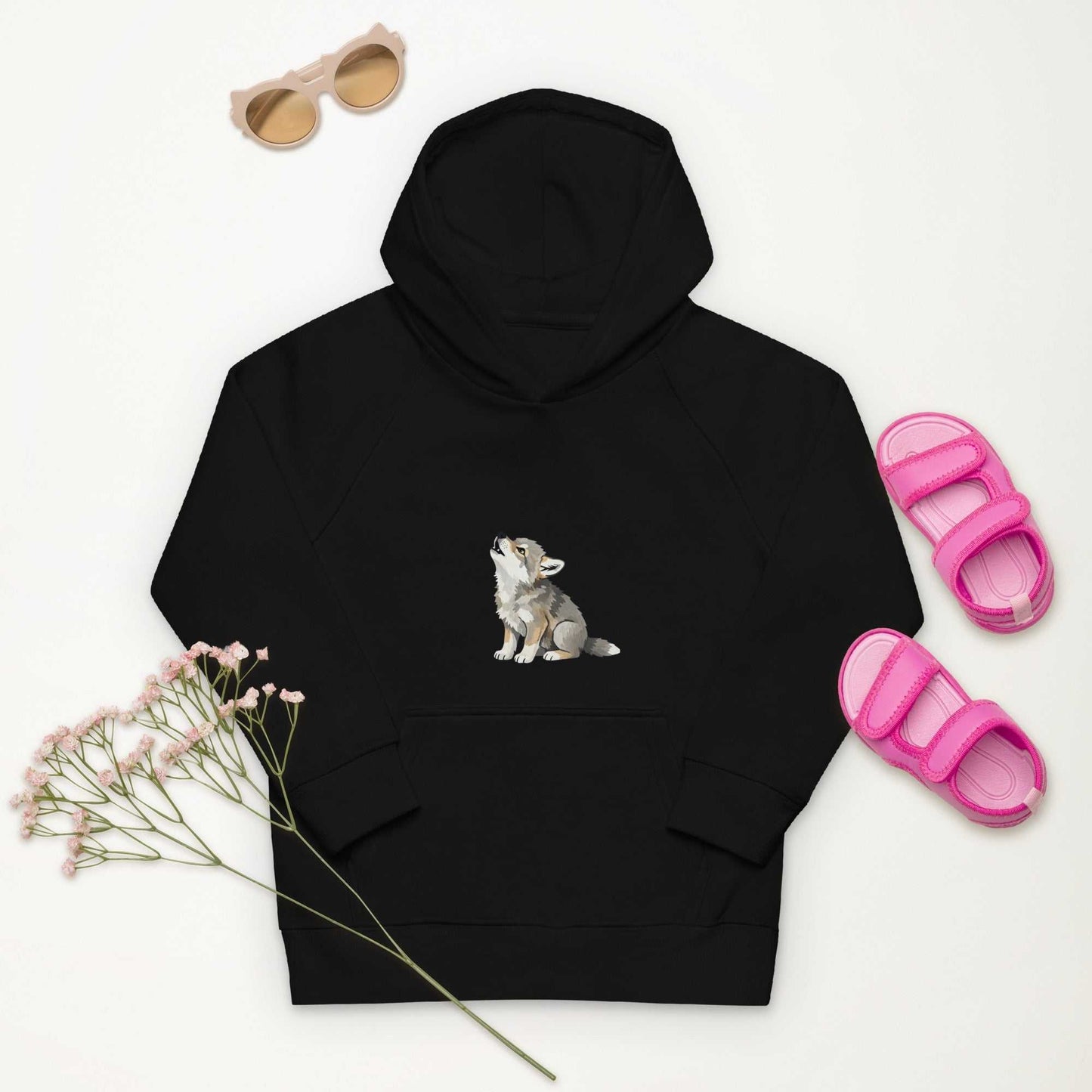 Black kids eco hoodie with baby wolf design, styled with pink sandals and sunglasses. Organic cotton hoodie for girls.