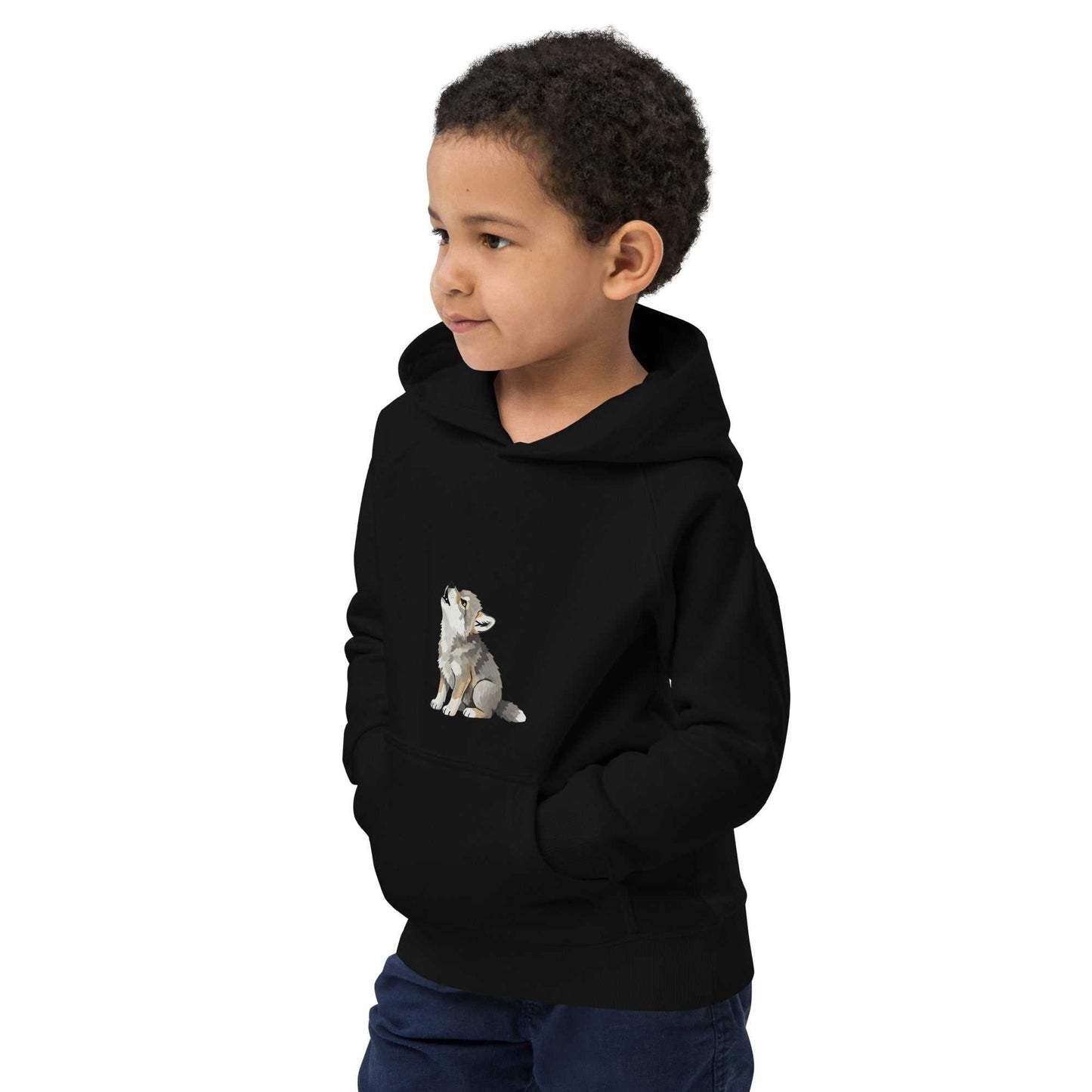 Boy wearing black kids eco hoodie with baby wolf design. Organic cotton hoodie offering comfort and eco-conscious style for children.