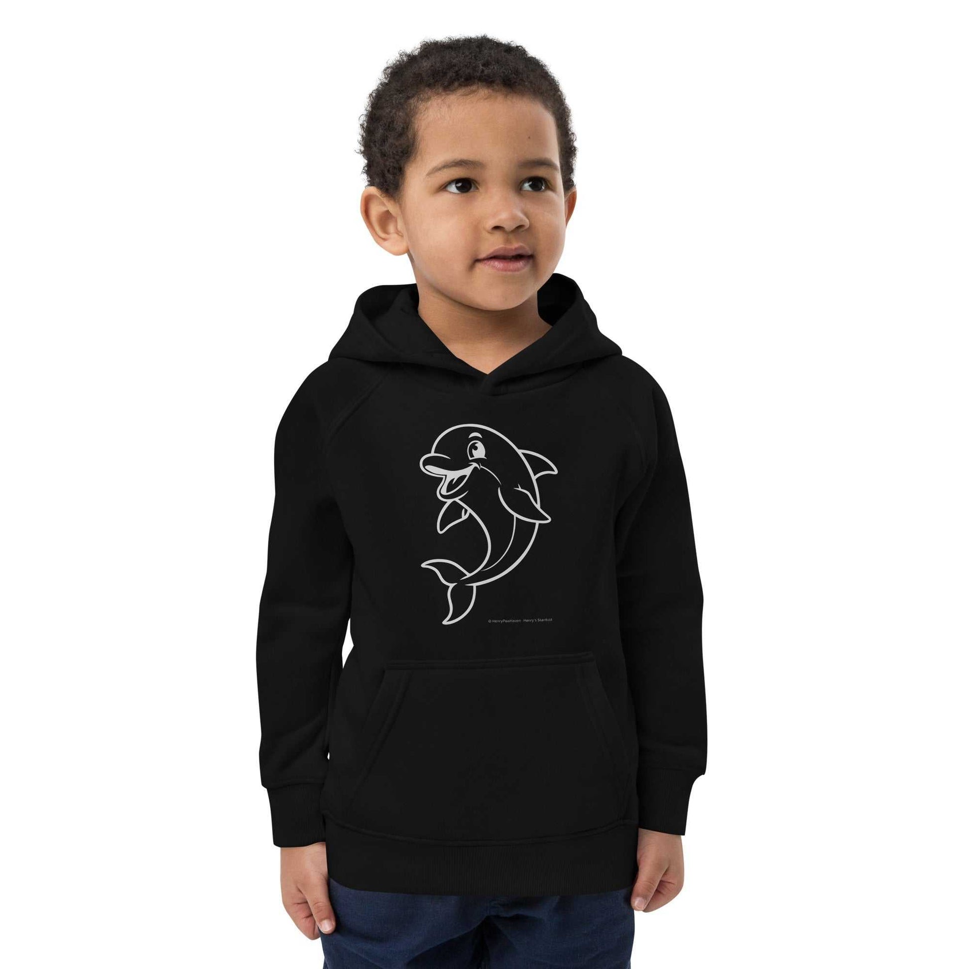 Young boy modeling black Kids Eco Hoodie Dolphin with dolphin print. Made from organic and recycled materials for eco-conscious kids.