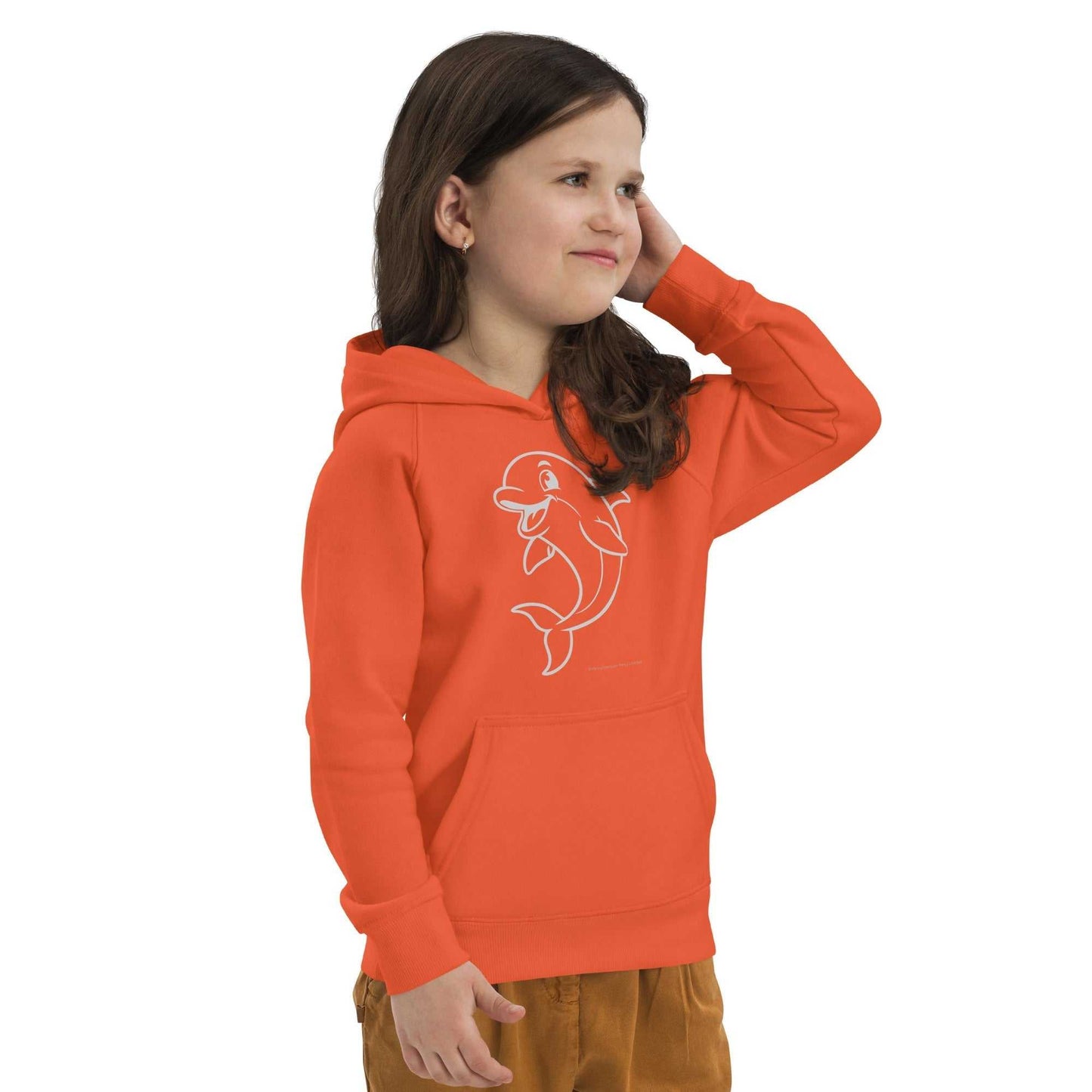 Child in orange Kids Eco Hoodie Dolphin with dolphin graphic, posing with hand on head. Eco-friendly and playful kidswear.