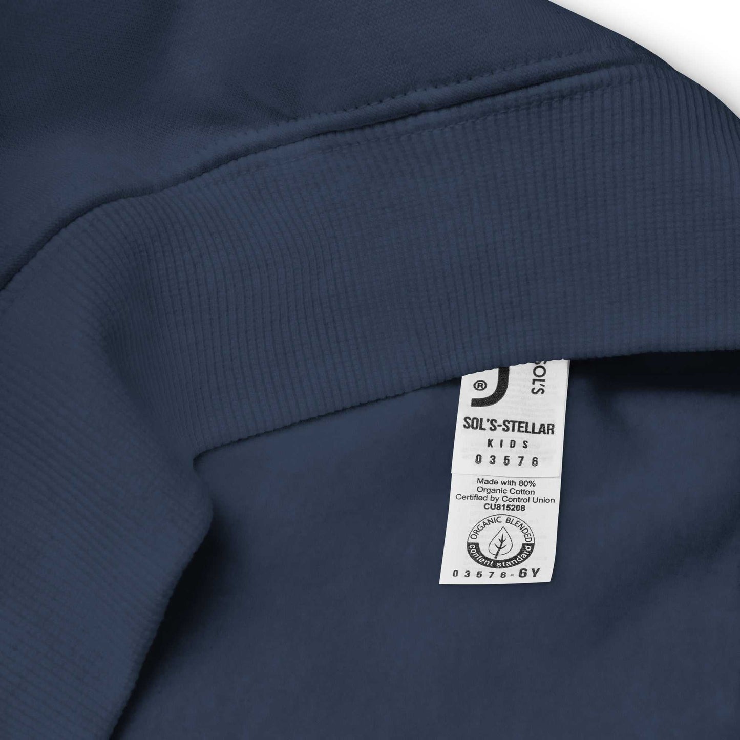 Interior label of navy blue kids eco hoodie, indicating organic cotton content and certified eco-friendly production.