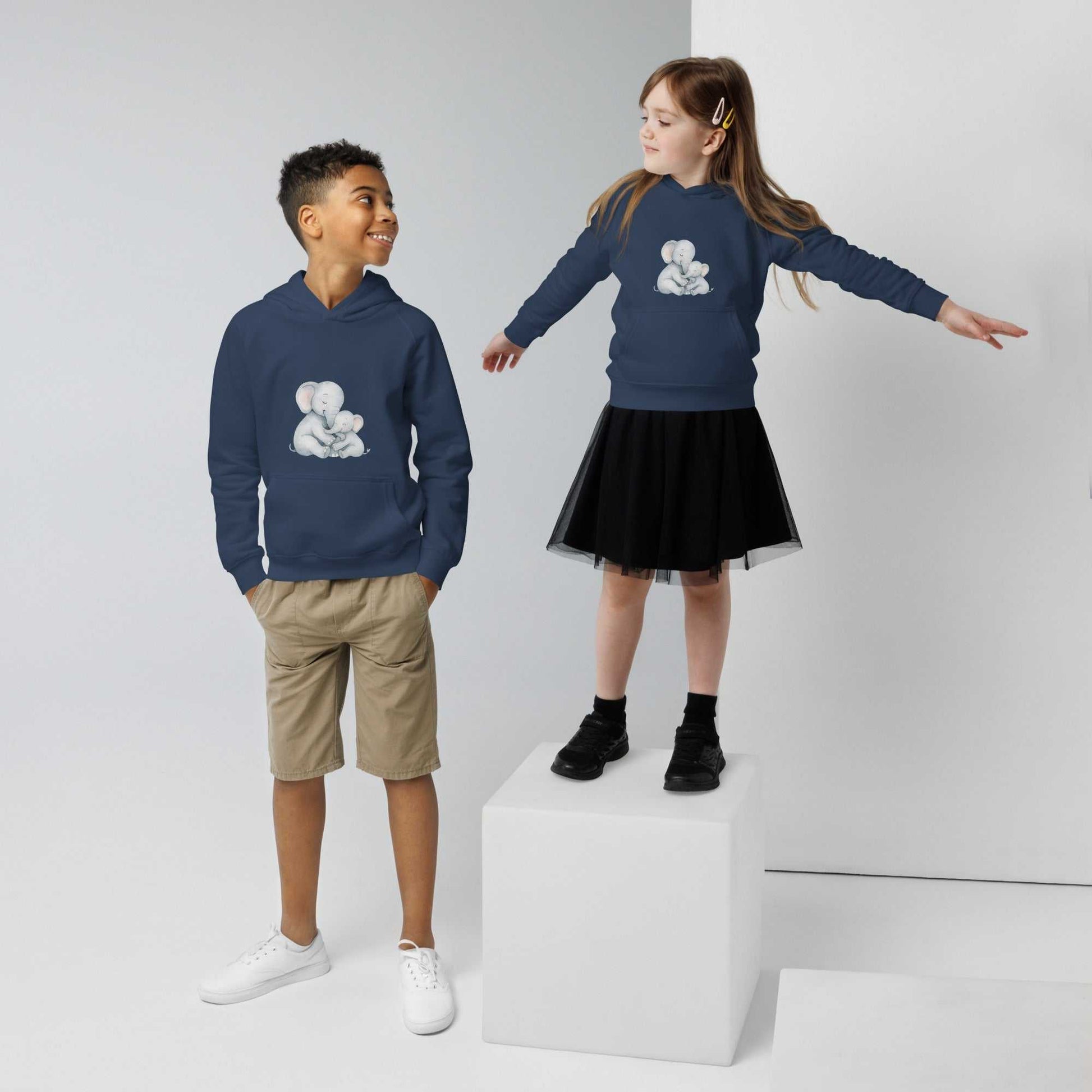 Navy blue kids eco hoodies with elephant design, modeled by two kids highlighting soft, organic cotton activewear.