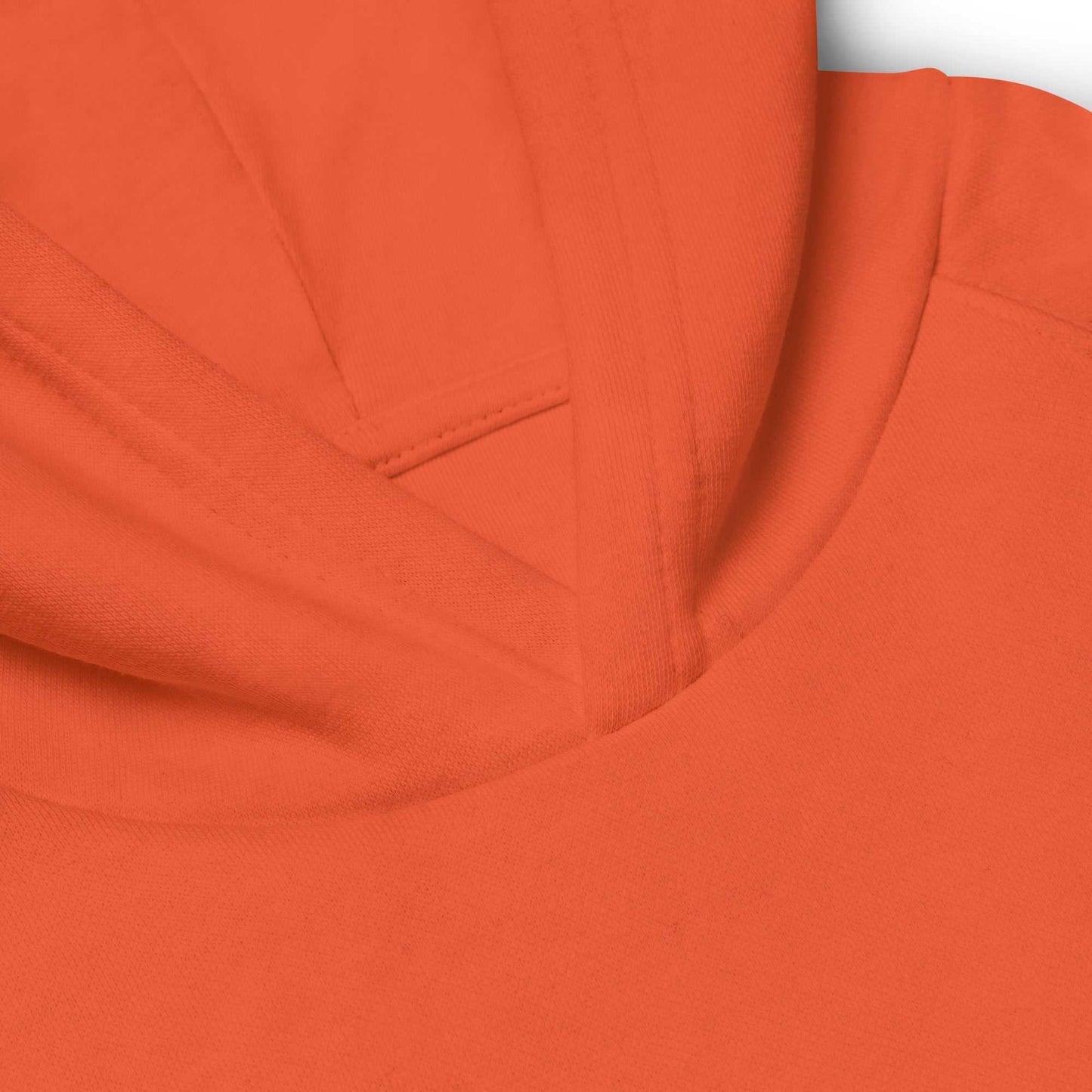 Close-up of orange kids eco hoodie hood, made from soft organic cotton with clean stitching for comfort and durability.