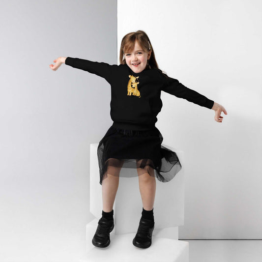 Girl wearing black kids eco hoodie with giraffe print, organic cotton activewear. Comfortable and eco-friendly hoodie for kids.