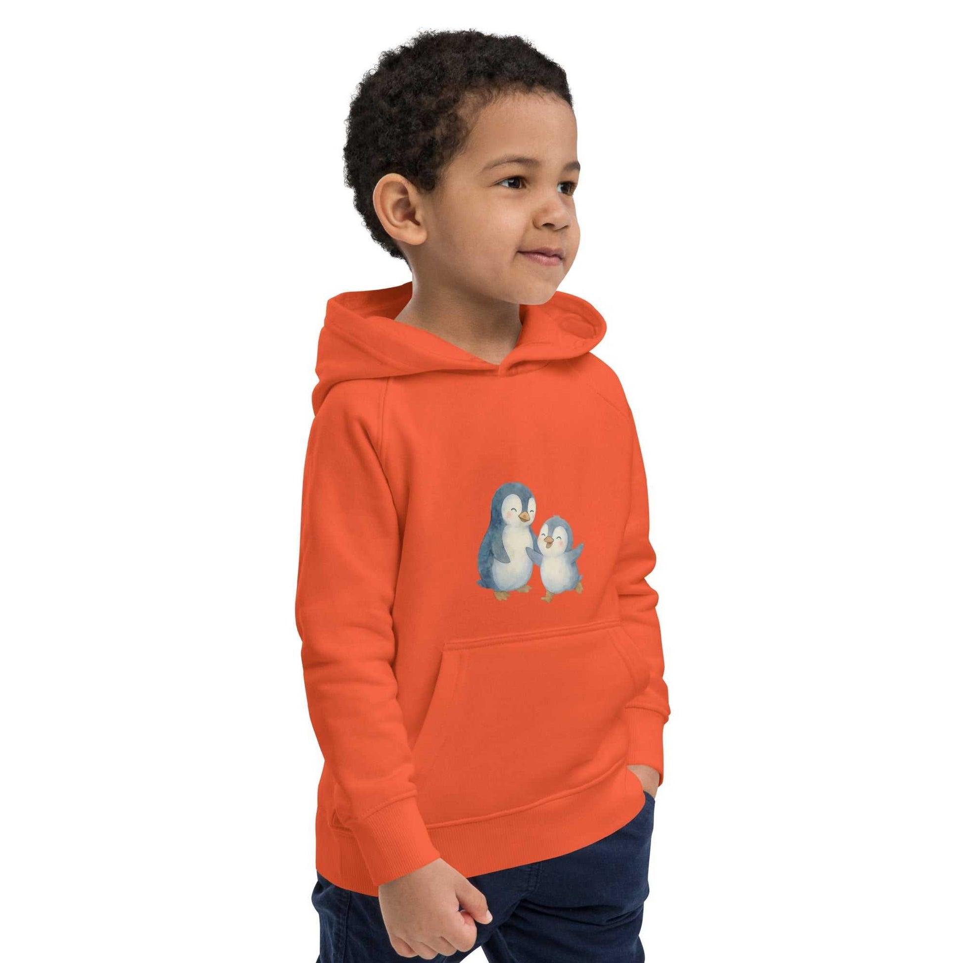 Bright orange organic cotton hoodie for kids with mom and baby penguin design, fun and eco-conscious activewear.