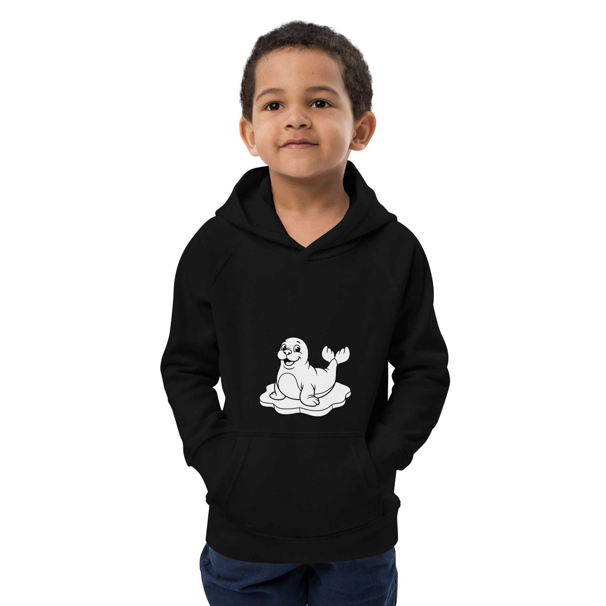 Young boy in black kids eco hoodie with seal illustration, crafted from organic cotton for warmth and eco-conscious style.