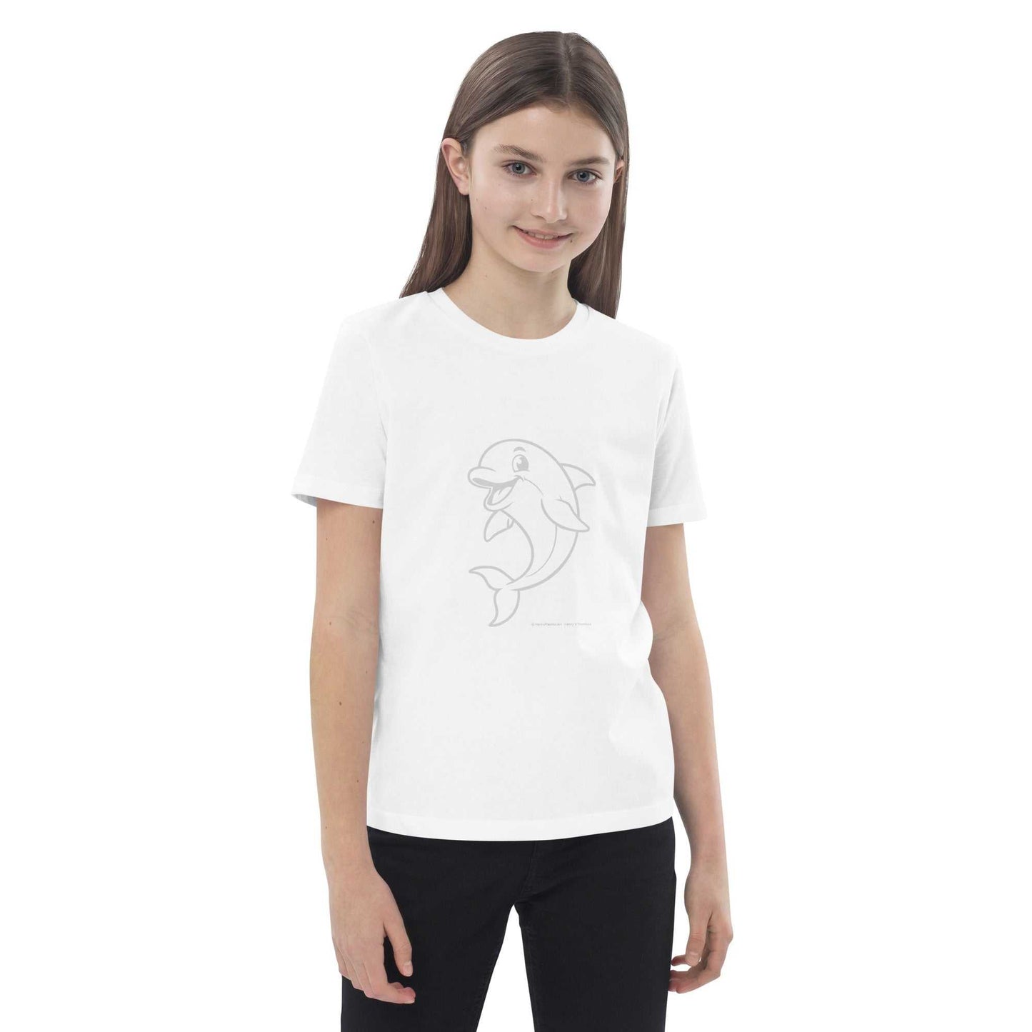 Smiling child in white Kids Organic Cotton T-Shirt with Dolphin Design. Made from soft, GOTS certified organic cotton.