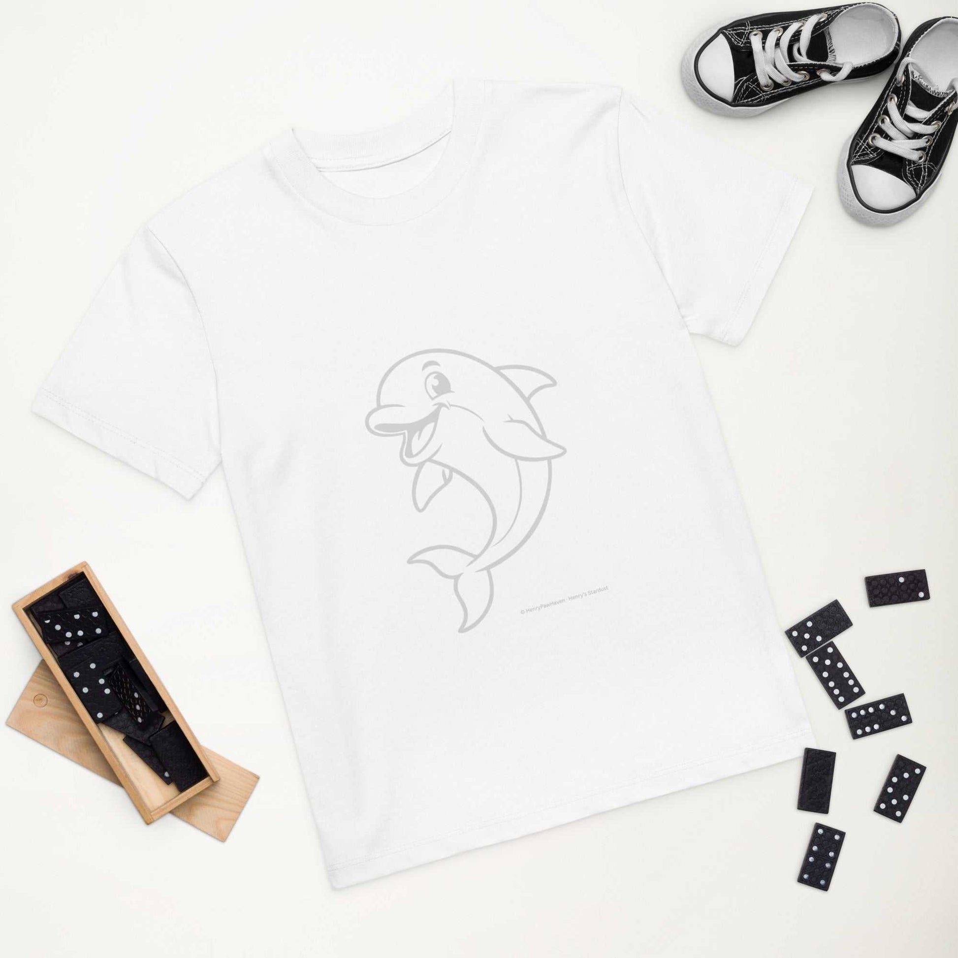 White Kids Organic Cotton T-Shirt with Dolphin Design laid flat. Soft, sustainable, and GOTS certified for environmentally aware families.