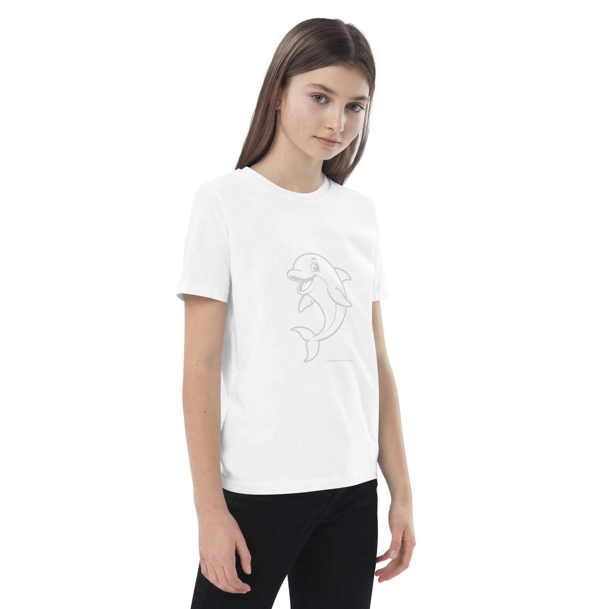 Angled front view of white Kids Organic Cotton T-Shirt with Dolphin Design on a child. Sustainable and eco-friendly kidswear.