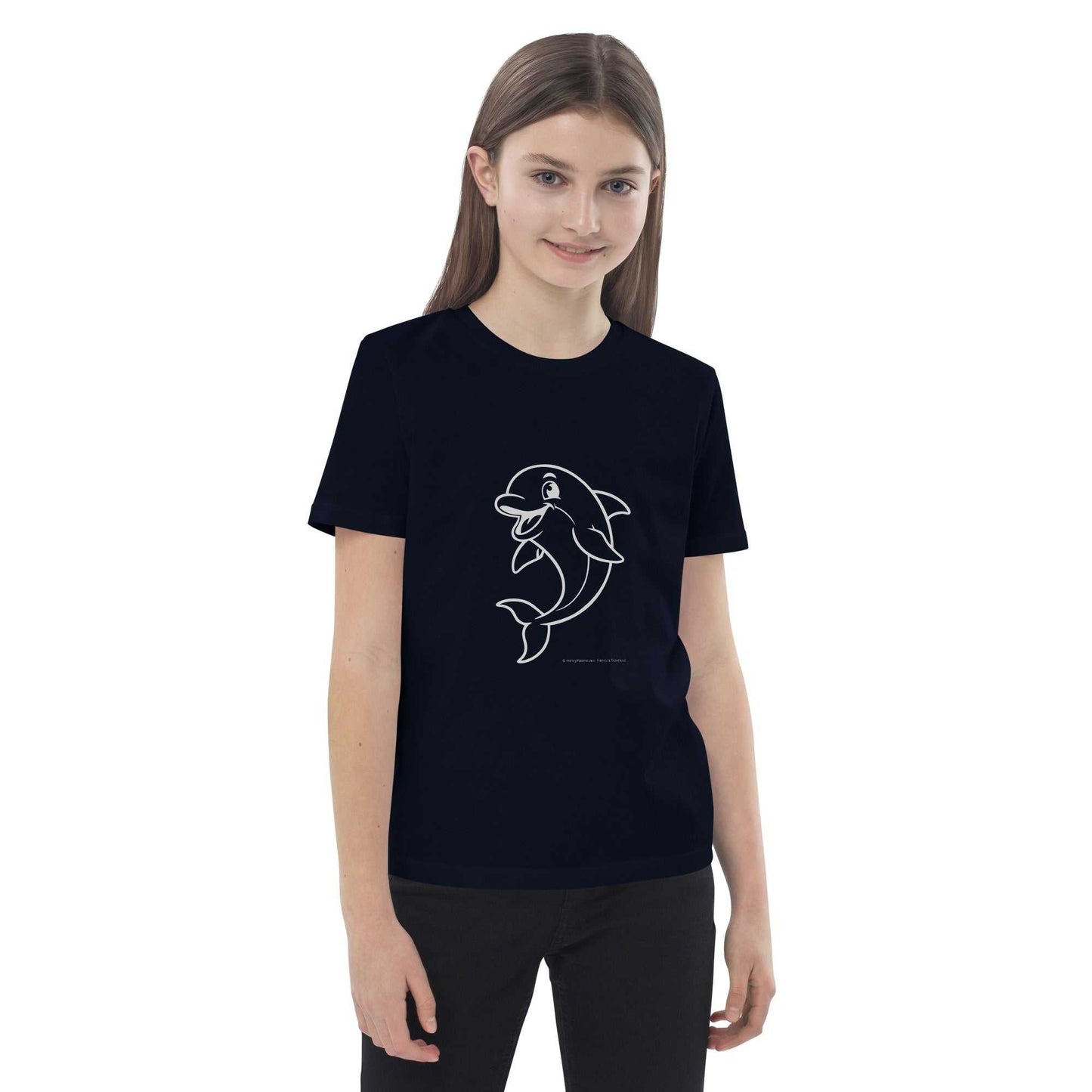 Smiling child in navy Kids Organic Cotton T-Shirt with Dolphin Design. Eco-friendly and GOTS certified for sustainable kids' fashion.