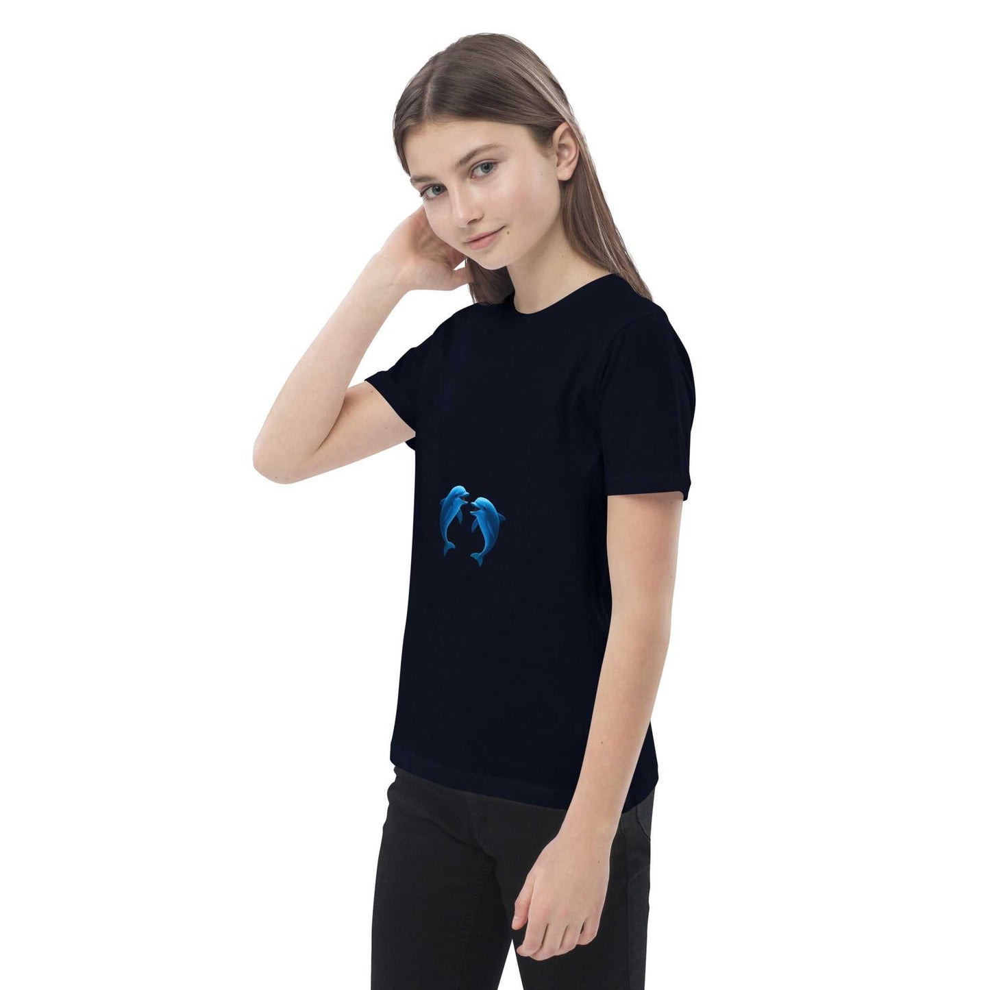 Child in navy Kids Organic Cotton T-Shirt with dolphin print. Soft, breathable, and sustainable kidswear.